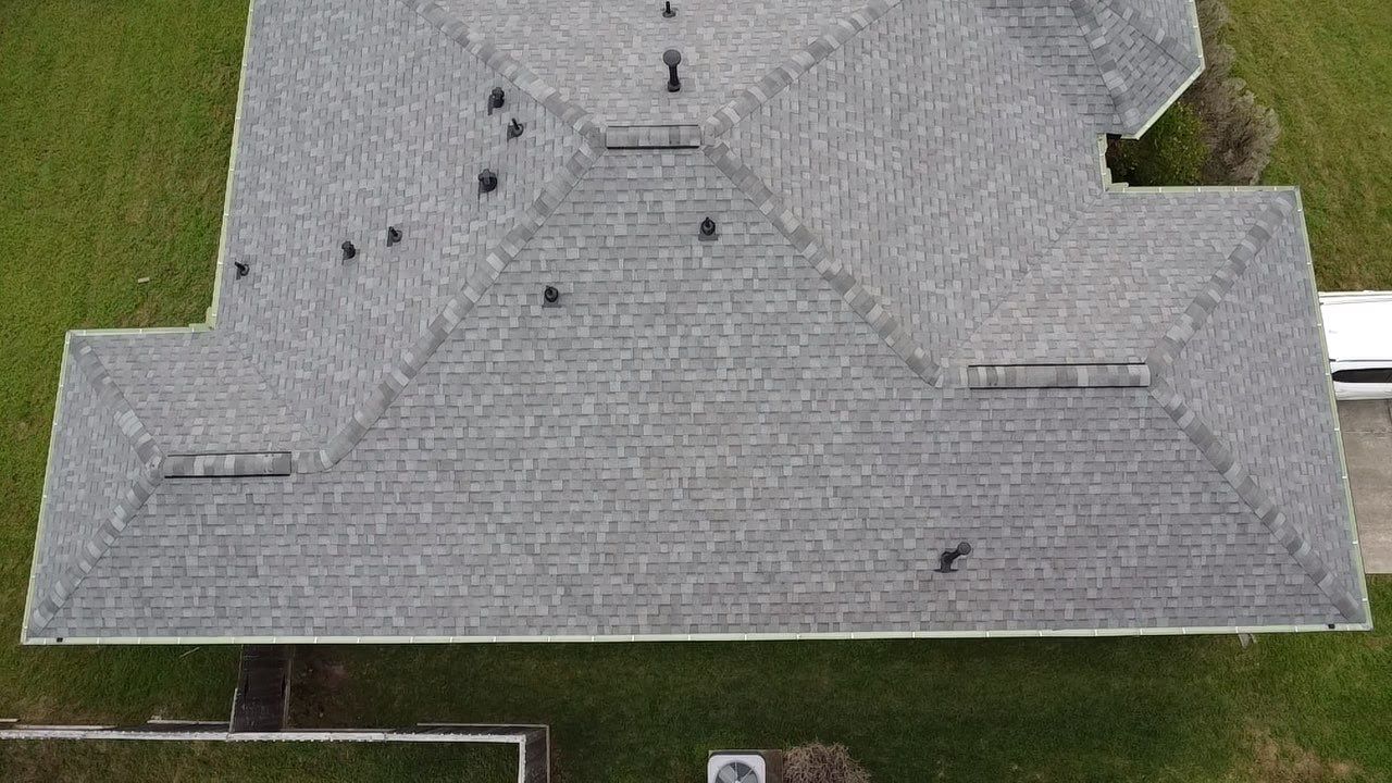 Reroof and Gutter Project in Houston by Roofing Technologies Unlimited