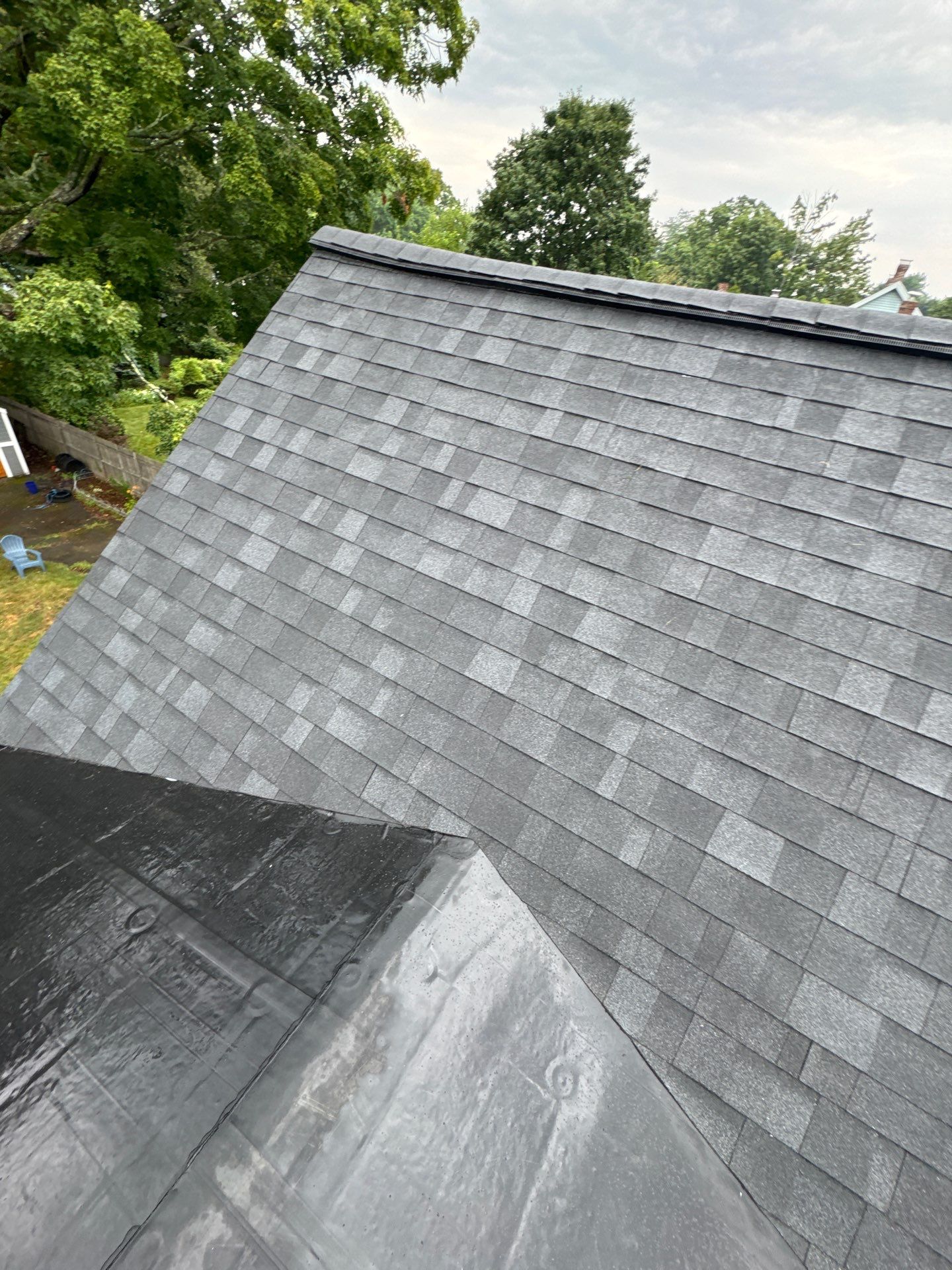 Full Roof Replacement + Custom Gutter Install | Onyx Black Finish by Mighty Dog Roofing of Greater Middlesex County