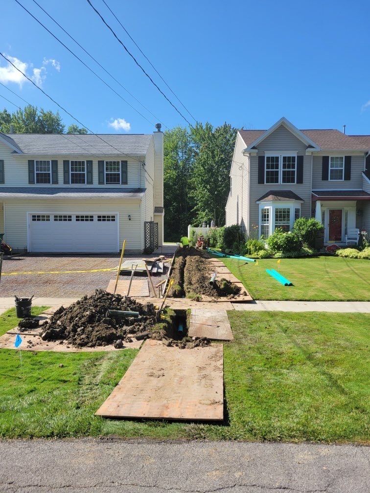 Stamped Concrete, Entry Door, and Concrete  by Ivy Lea Construction