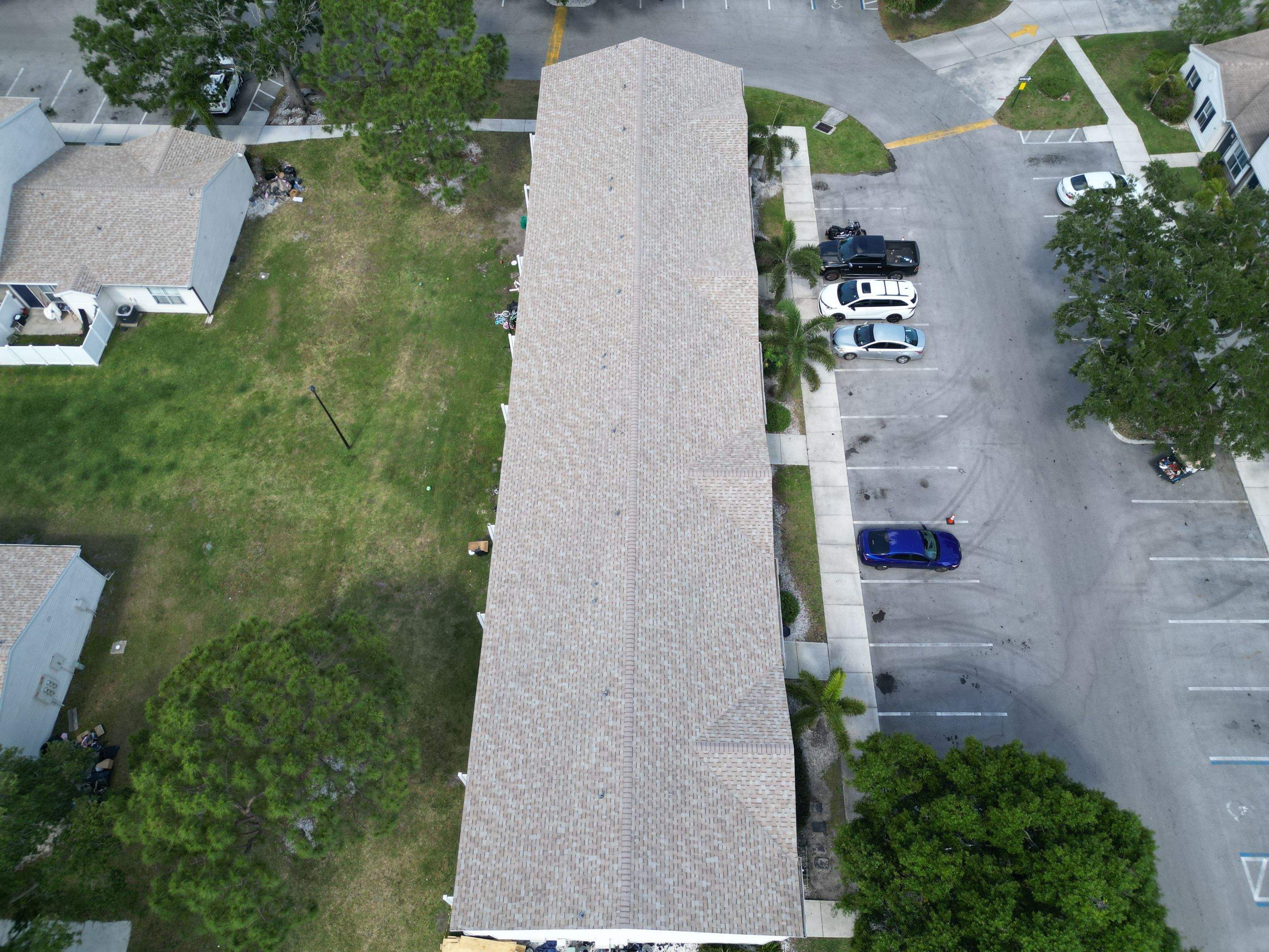 Apartment Complex Shingle Roof Replacement by Sailfish Roofing