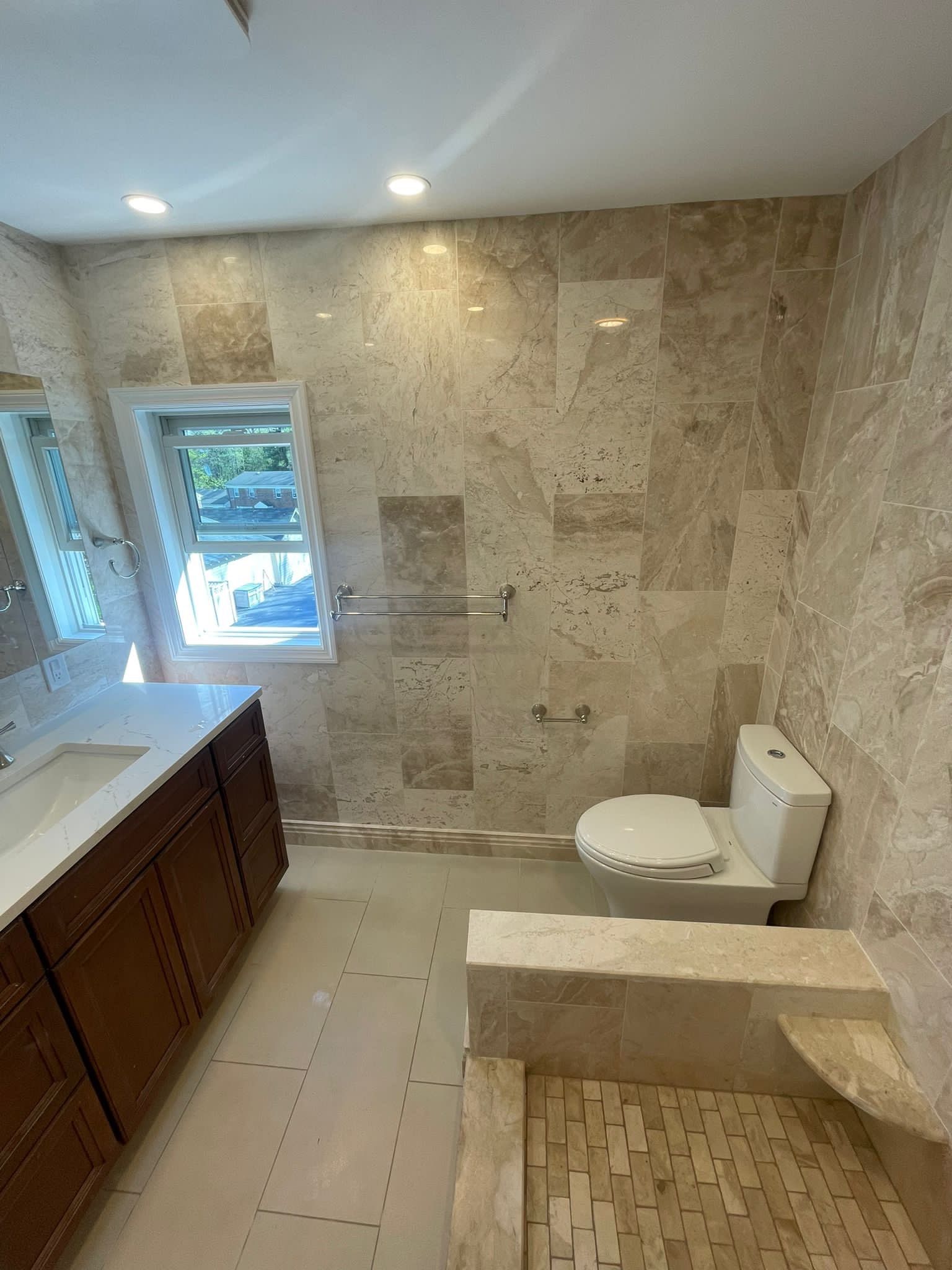 Bathroom Remodel using Tile by Home Concepts Construction