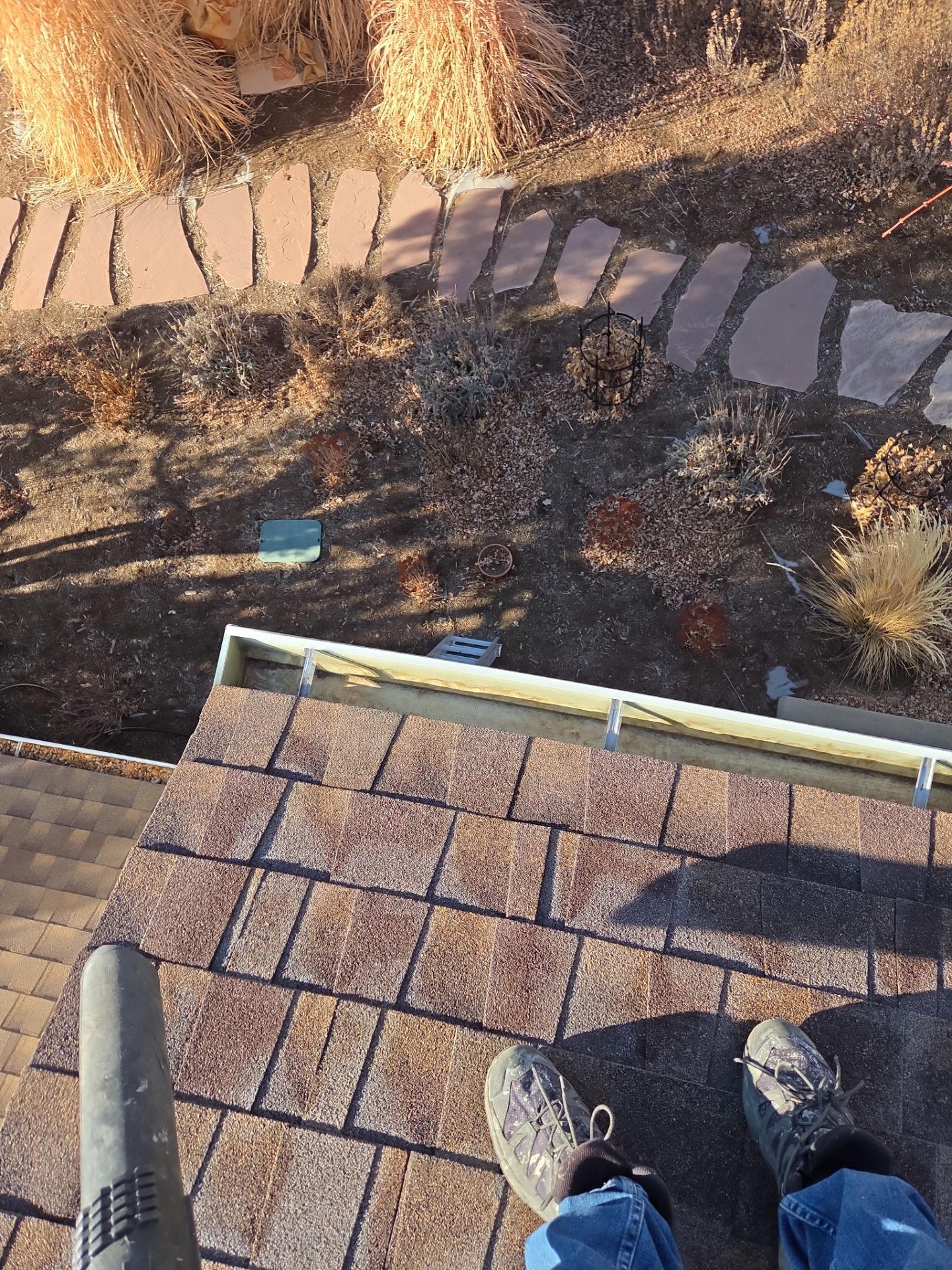 Clean Gutters and Downspouts by RTP Roofing Company