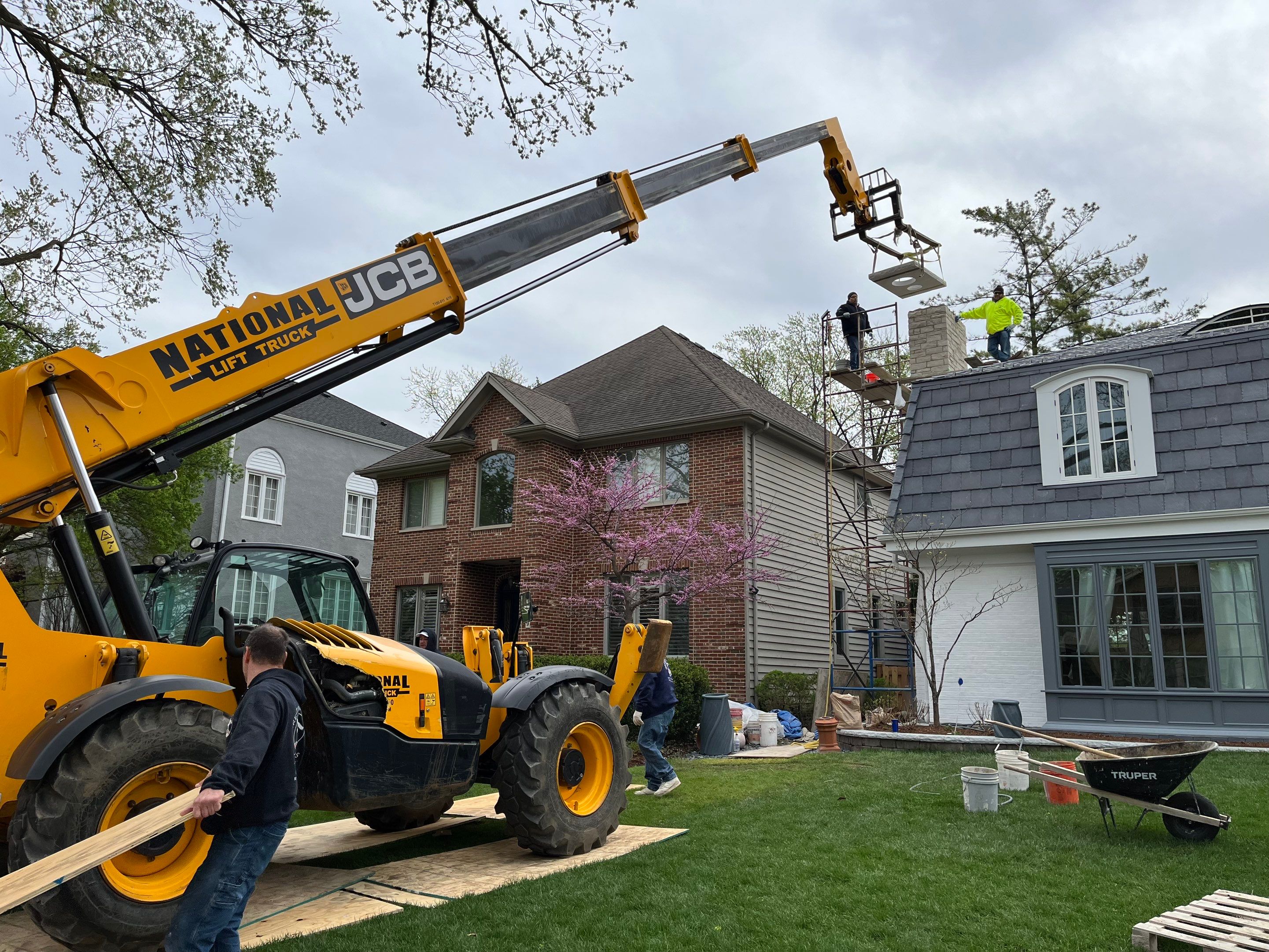 Elmhurst Home Exterior Renovation with Hardie Siding and New Portico by Great American Exteriors