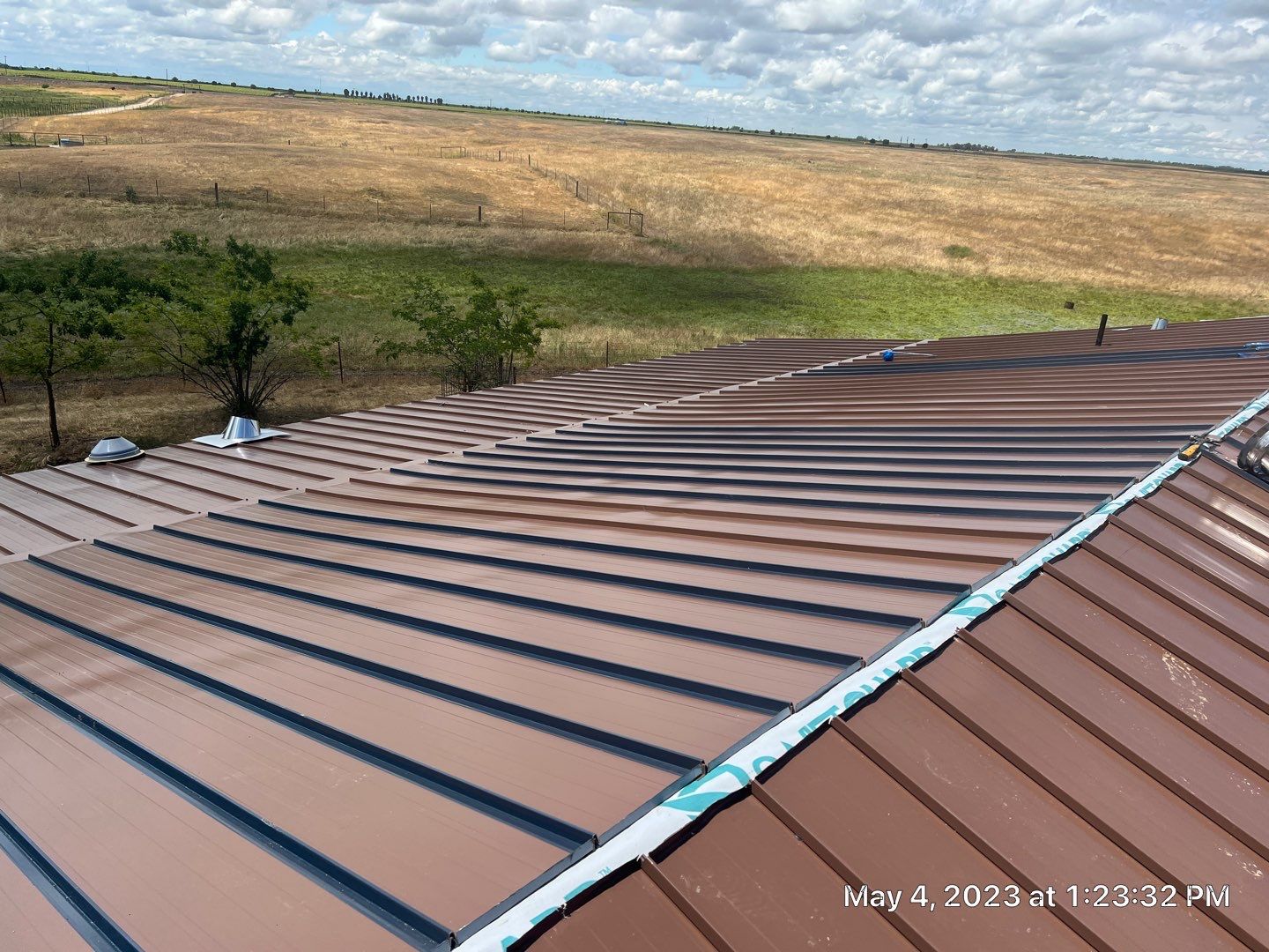 Metal roofing installation using Standing seam metal roofing system by Straight Edge Roofing Inc