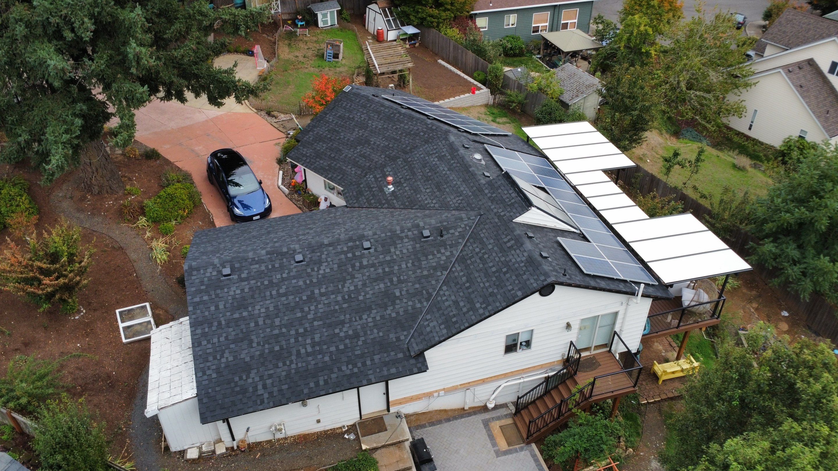 Granite Black Residential Roof Replacement by Orezona Building & Roofing Company, Inc.