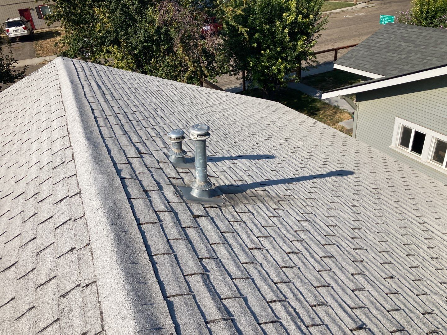 Nampa ID., single level Investment Property Roofing Installation using Owens Corning Oakridge in Peppermill Grey by ID Roofing LLC