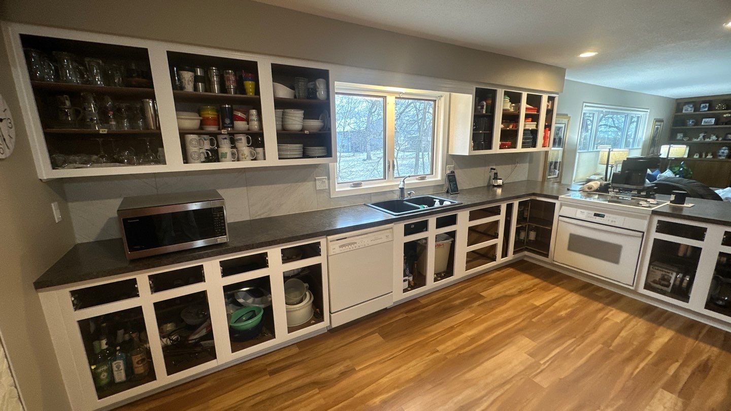 Kitchen Cabinet repaint by Cutting edge painting 