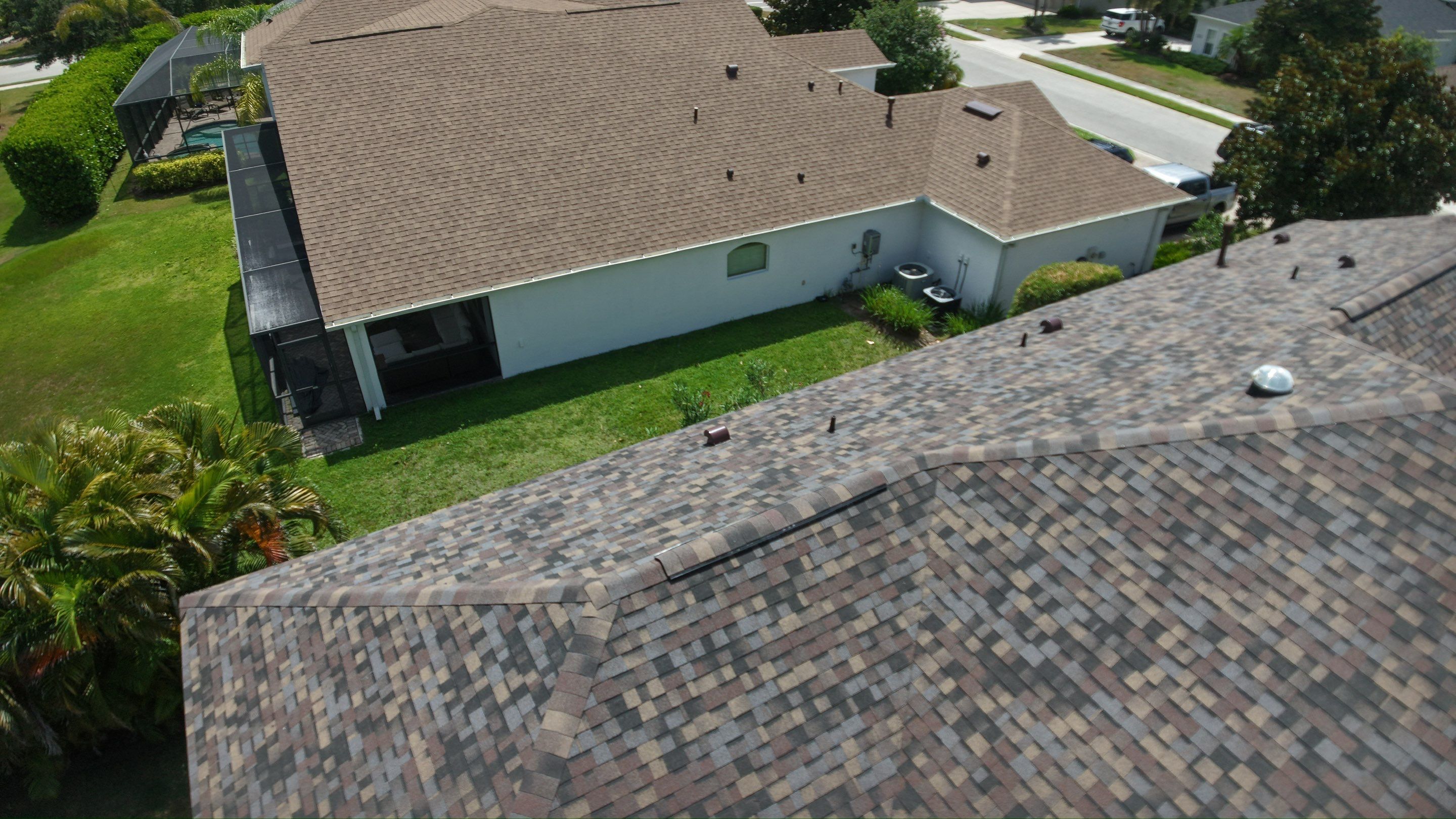 Architectural Summer Harvest Asphalt Shingle Roof Replacement in Bradenton, Florida by Trinity Restoration and Roofing LLC