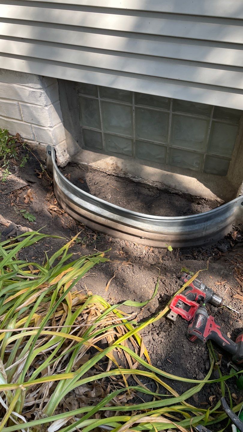 Drain Tile, Window Wells & Buried Discharge in Minneapolis by Waterproofing Northeast