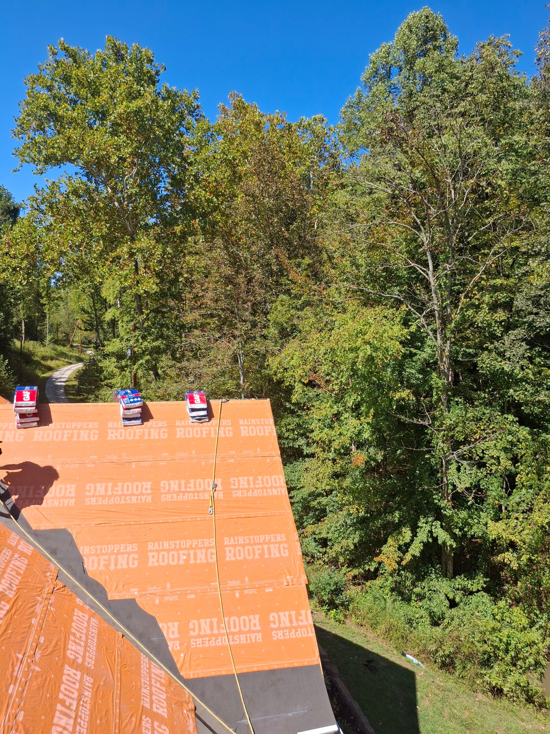 Residential Roofing Installation using GAF Timberline HDZ Charcoal by Rainstoppers Roofing