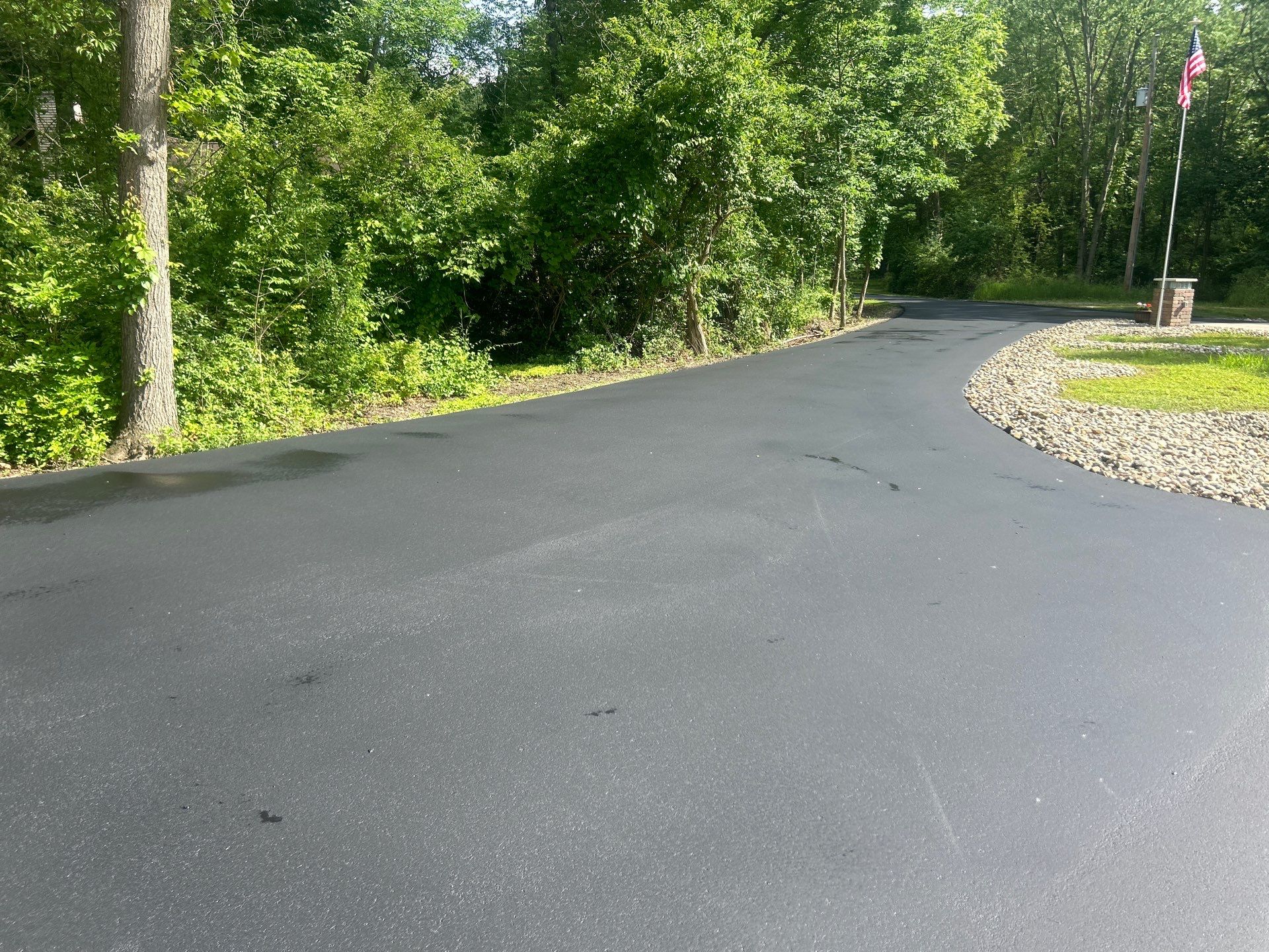 High end residential driveway by Quality Asphalt & Maintenance LLC