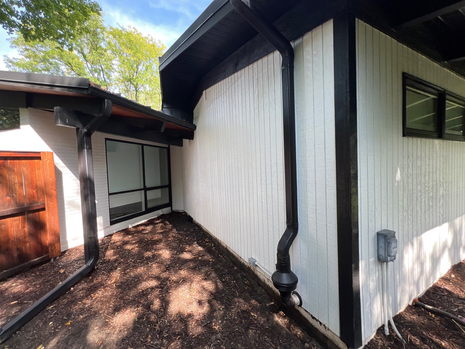 Complete Exterior House, Bluestone & Garage Floor Cleaning by Northern Power Washing LLC.