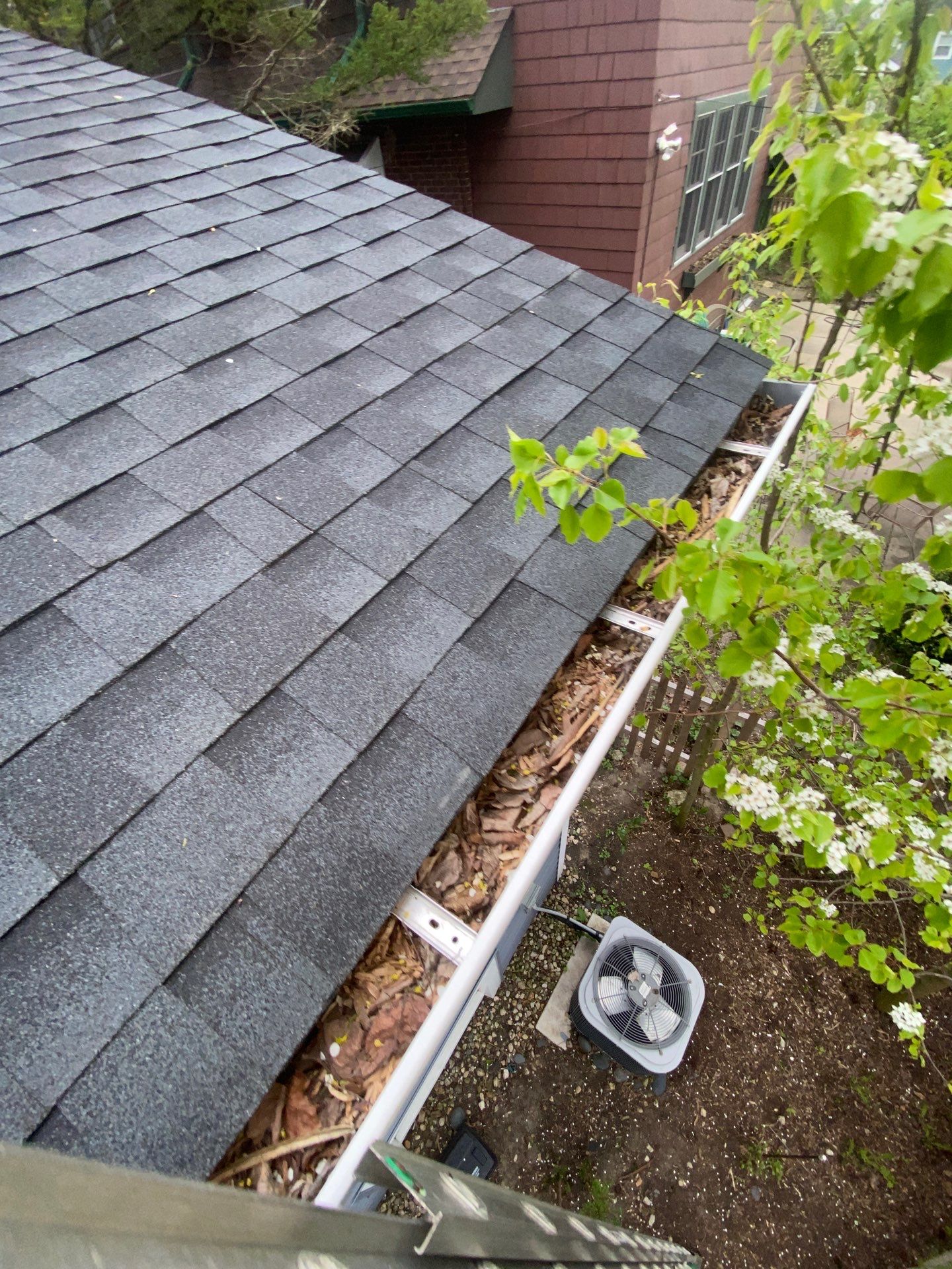 Asphalt Roof, Vinyl Siding, and Aluminum Gutter Replacement by Custom Installations