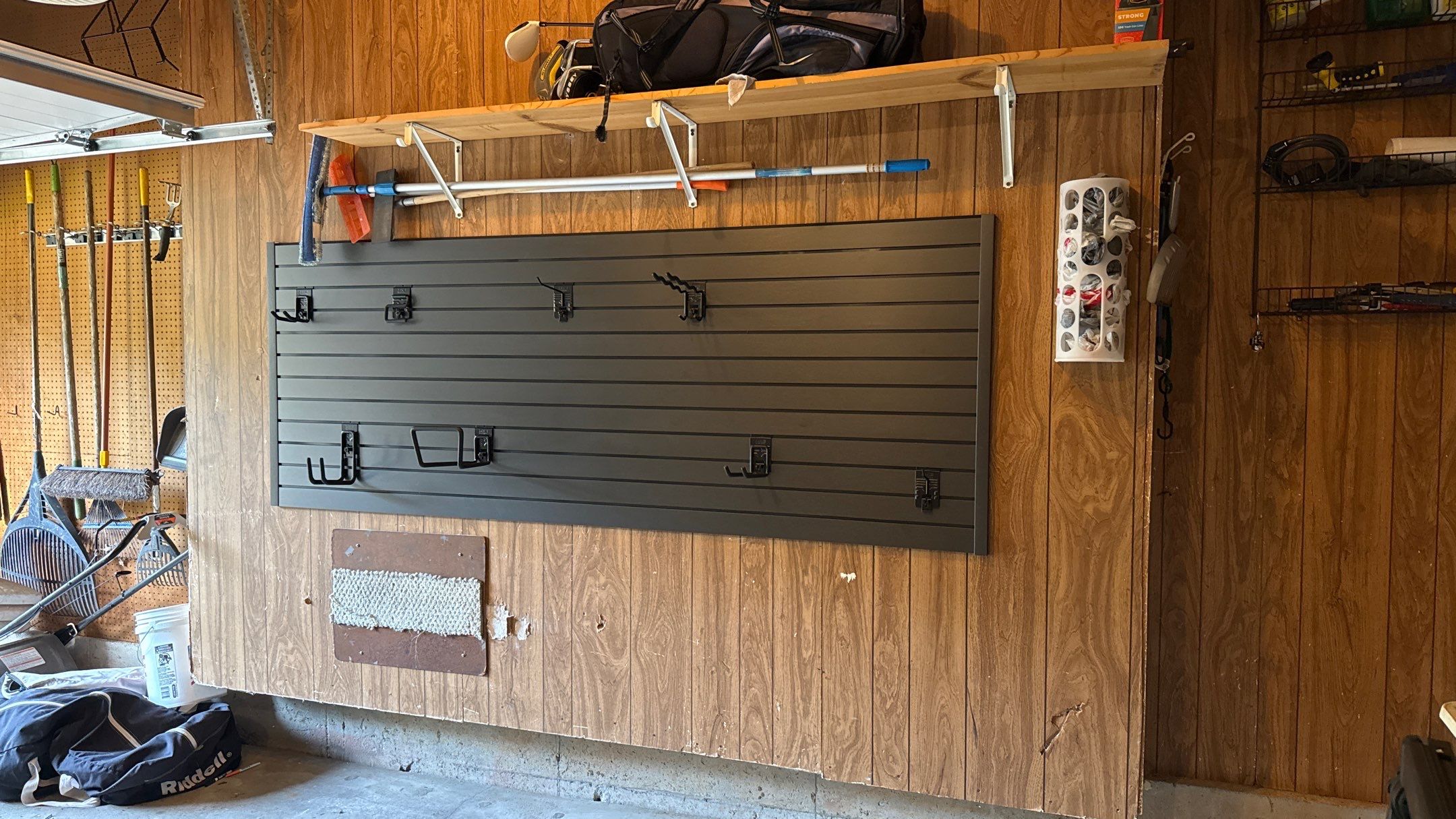 Custom Slatwall Storage System Installation in Overland Park Garage by Banner Garage