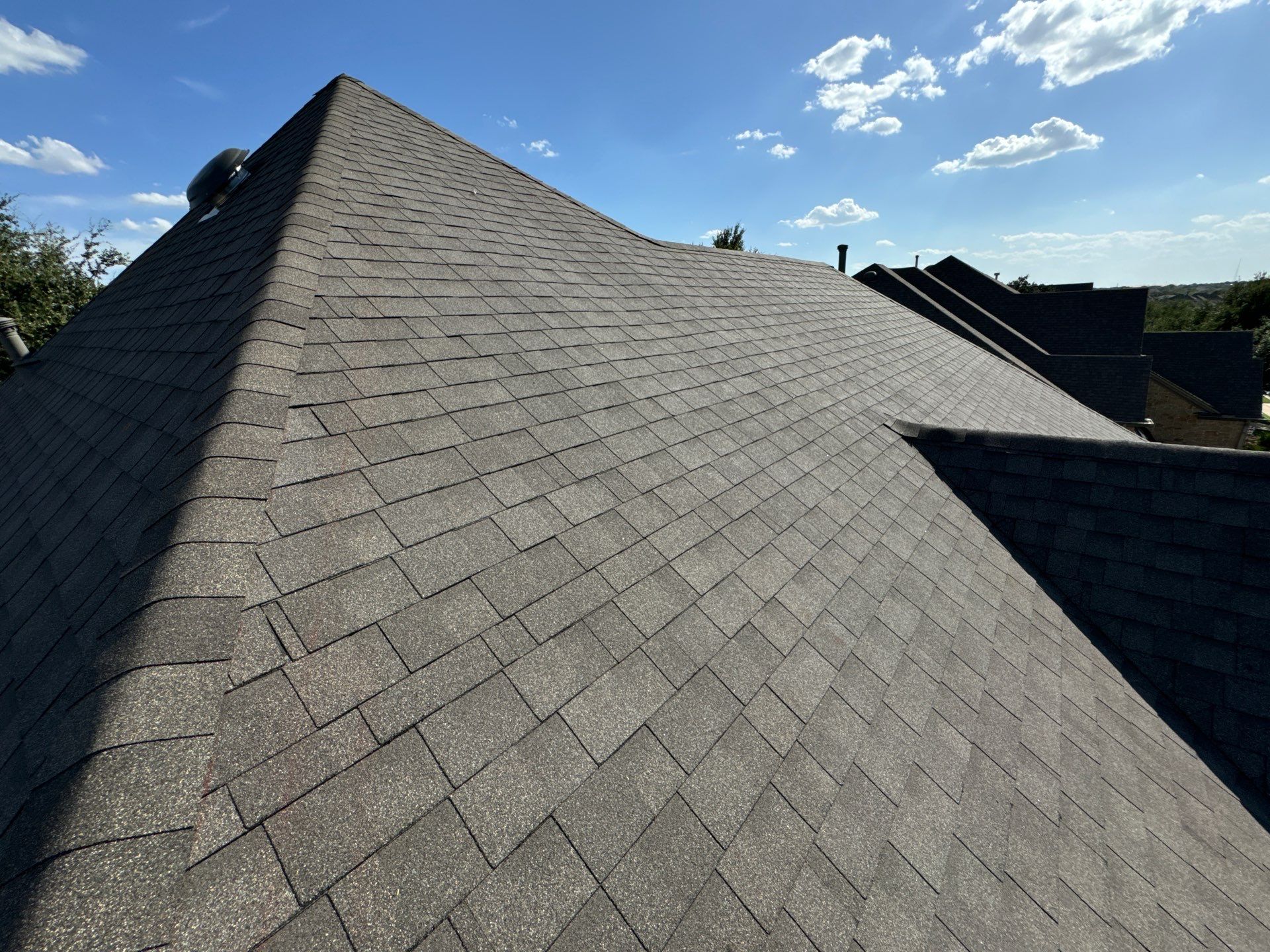 Residential Roofing Installation using IKO, Cambridge in Weathered Wood by Oakwood Roofing and Construction, LLC