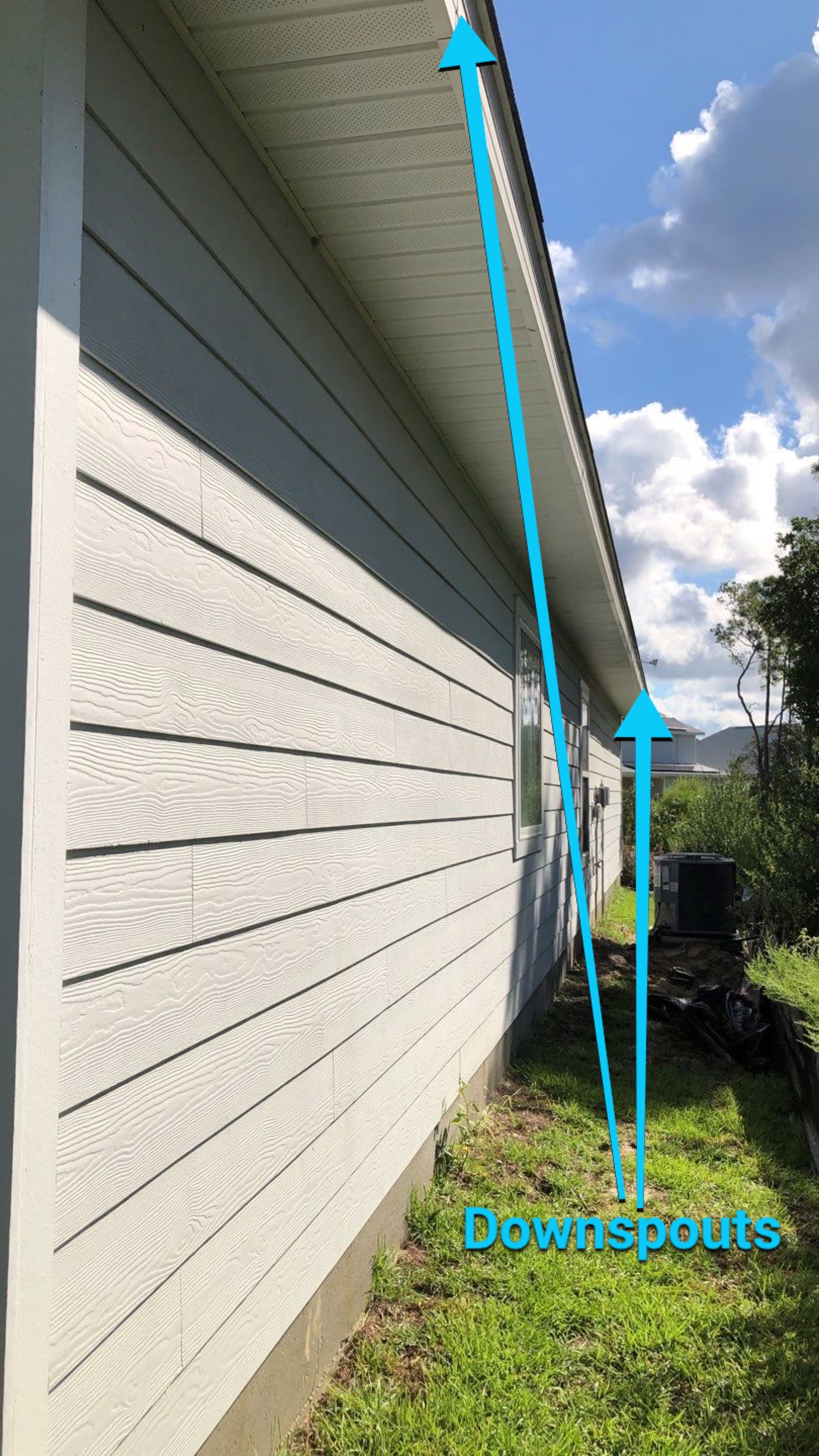 Seamless Gutter Installation using White by Gutter Professors