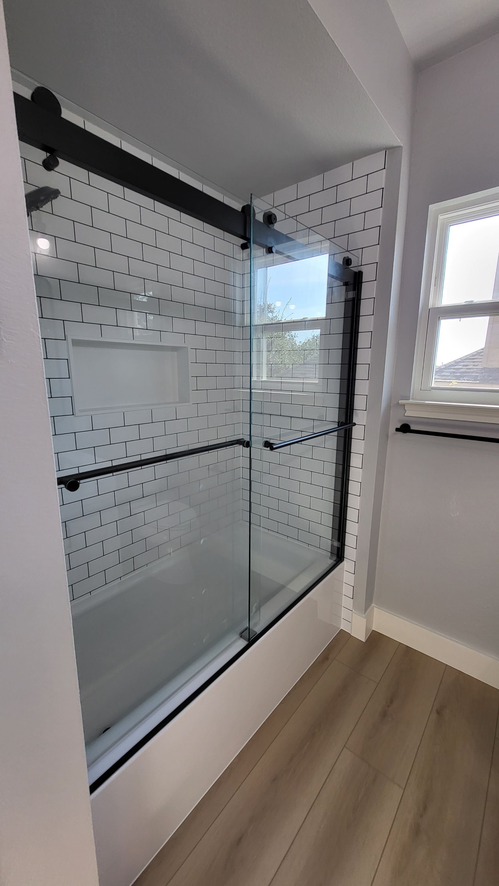 Stone Oak Bathroom Refresh with Modern Subway Tile Before and After by Legacy Bath and Kitchen