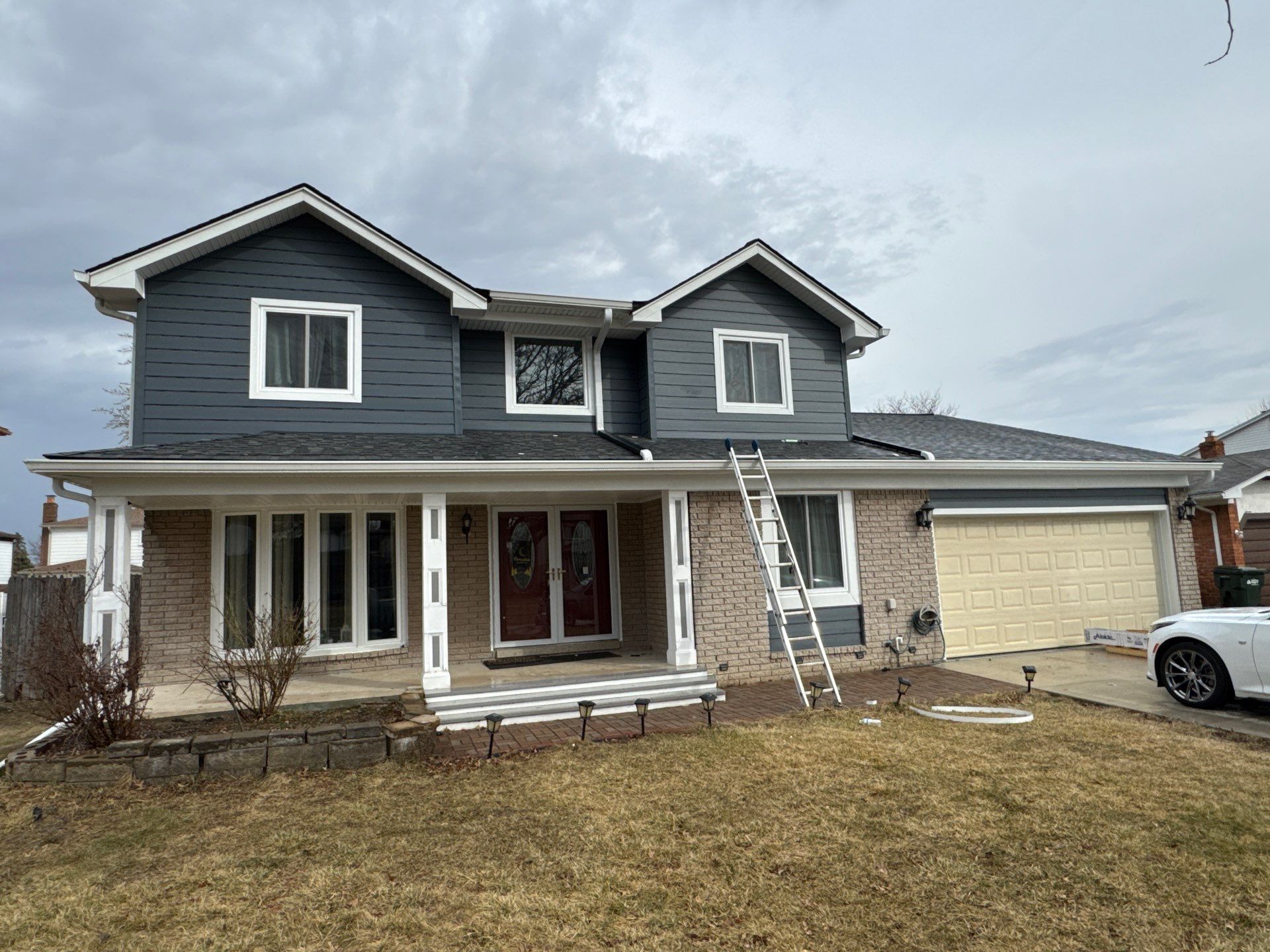 Siding Replacement using Alside Midnight Blue by 180 Contractors