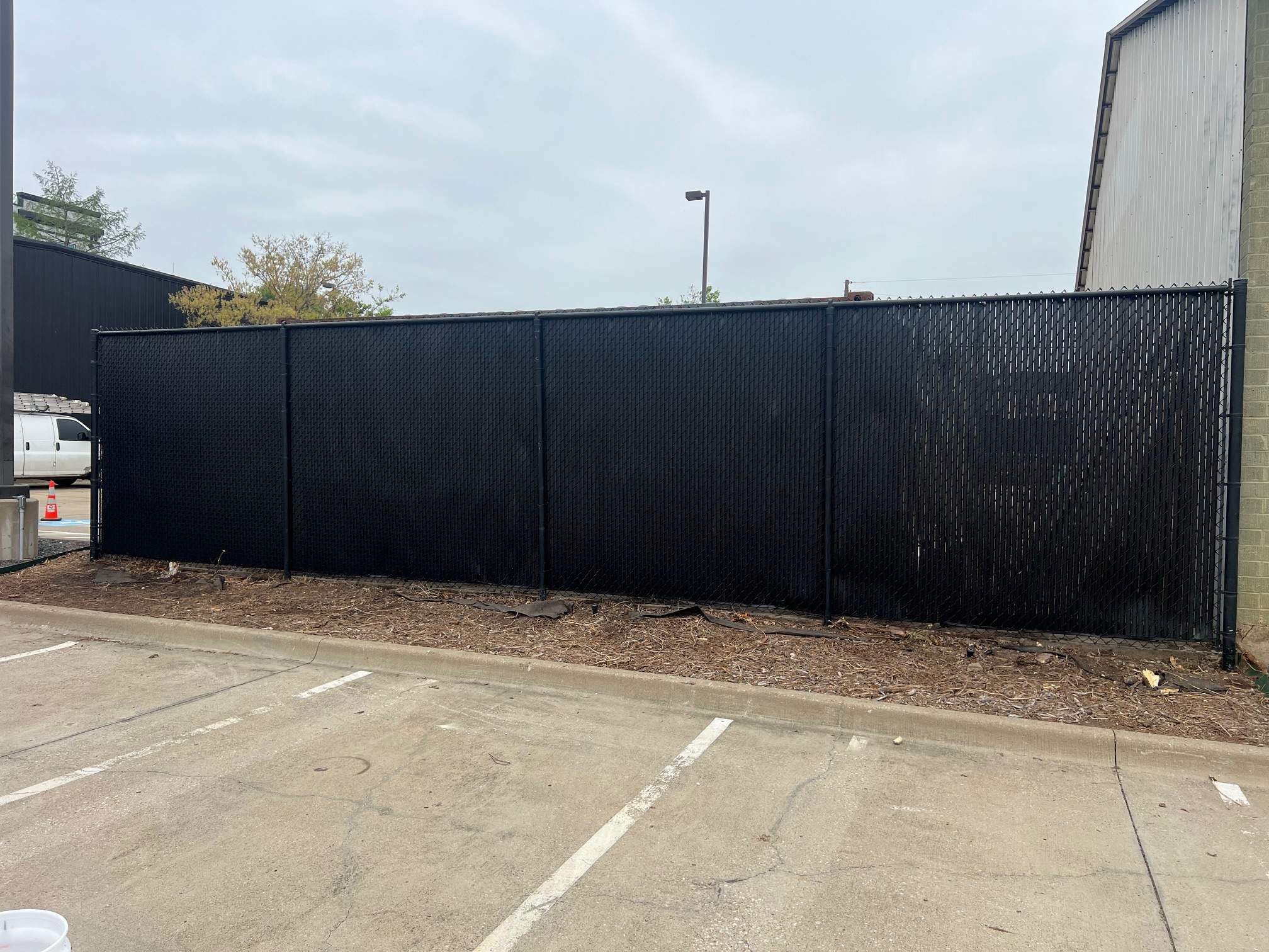 Chain link Privacy Slats by 3:16 Roofing and Construction