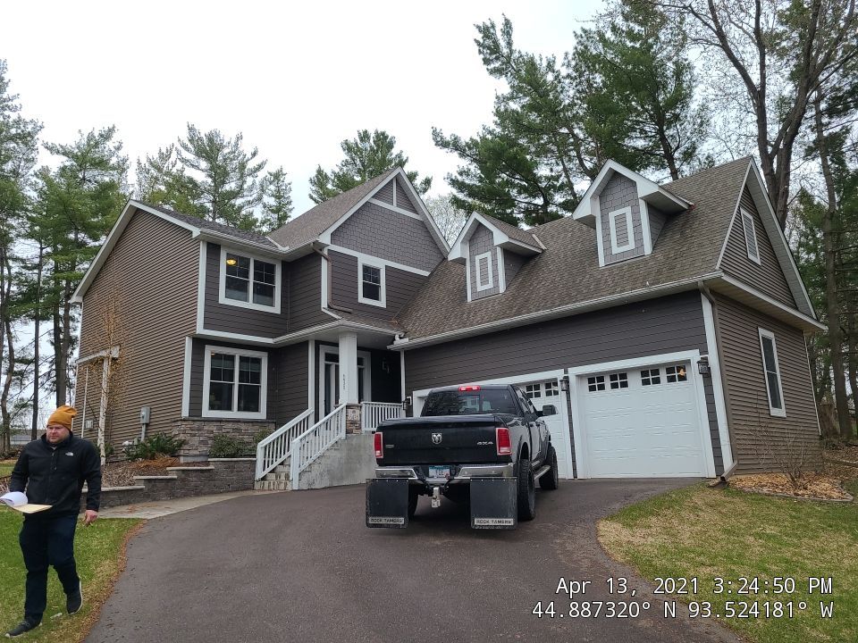 Chanhassen, MN – Roof Replacement with Gutter Guard Upgrade by First Impressions Exteriors