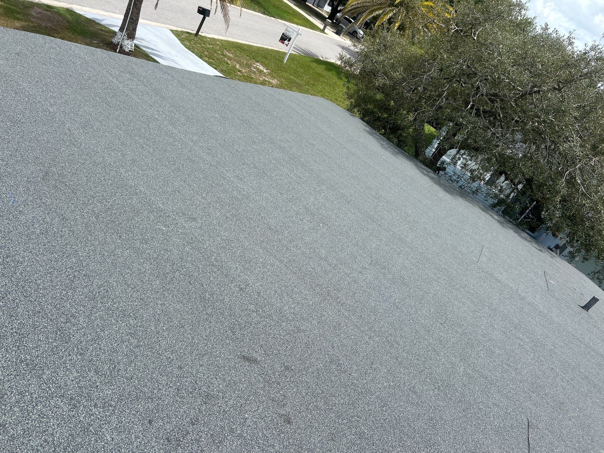 Colonial Slate Modified Bitumen Flat Roof Replacement in Daytona Beach by Pinnacle Roofing Group