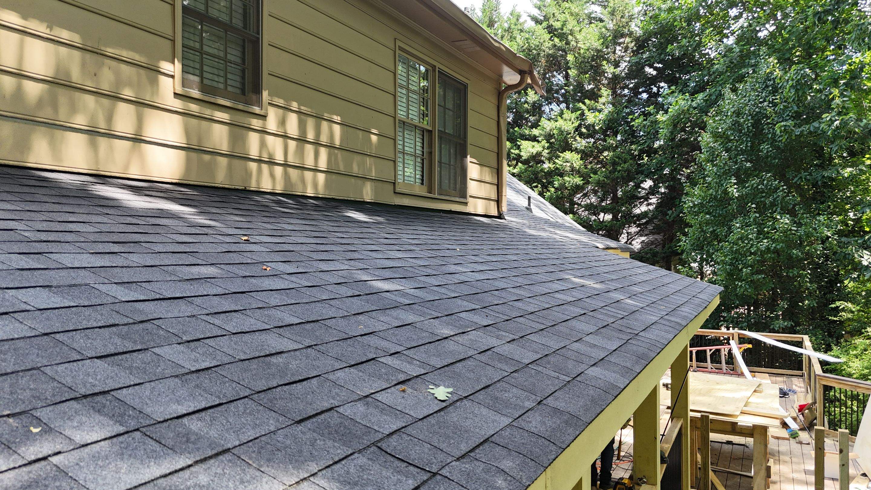 Deckorators Voyage Deck and Shed Style Covered Porch Build with Drink Rail by Nelson Exteriors 