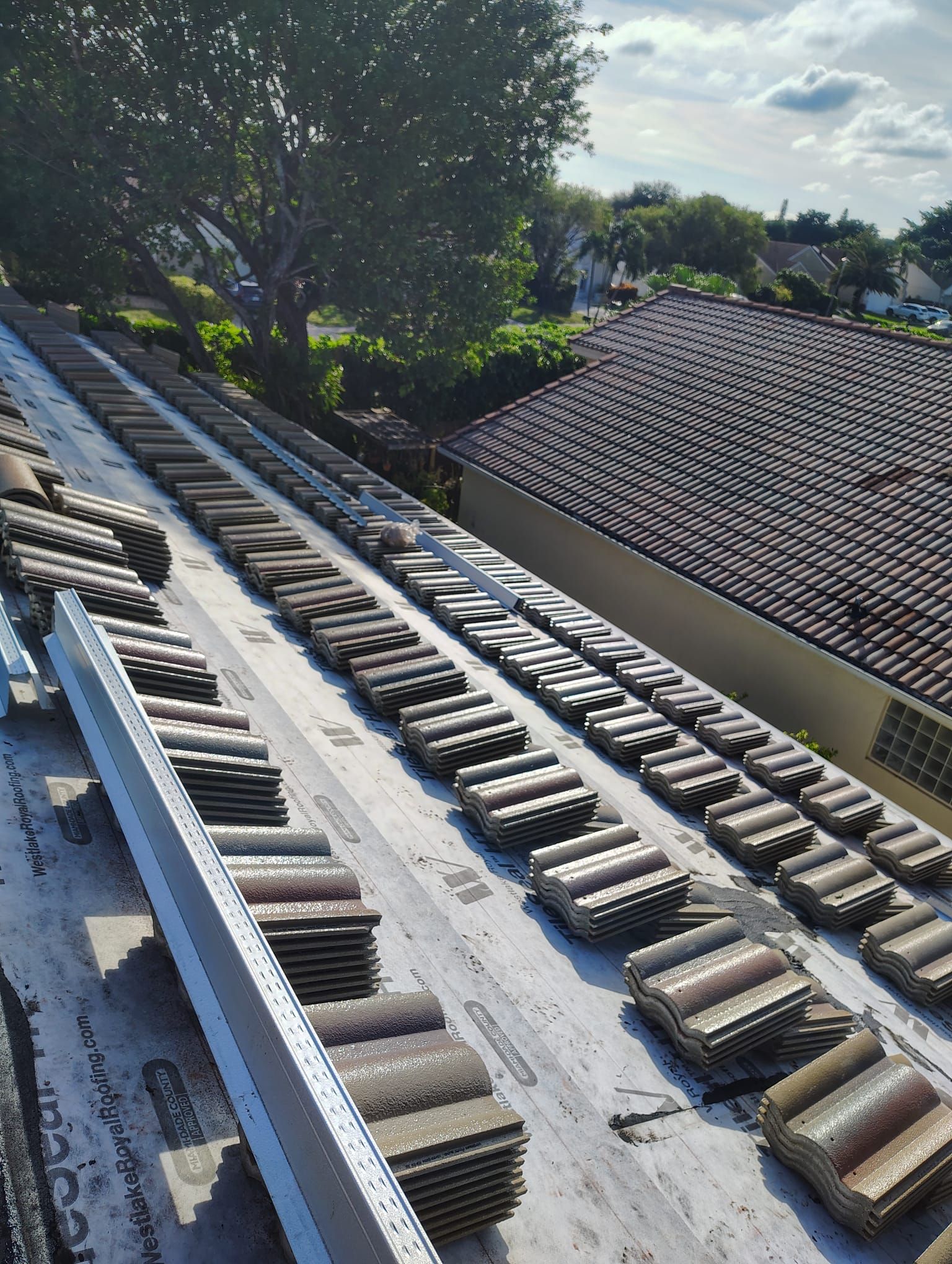 Concrete Tile Roof Replacement and Wood Decking Repair in Boca Raton by Aastro Roofing