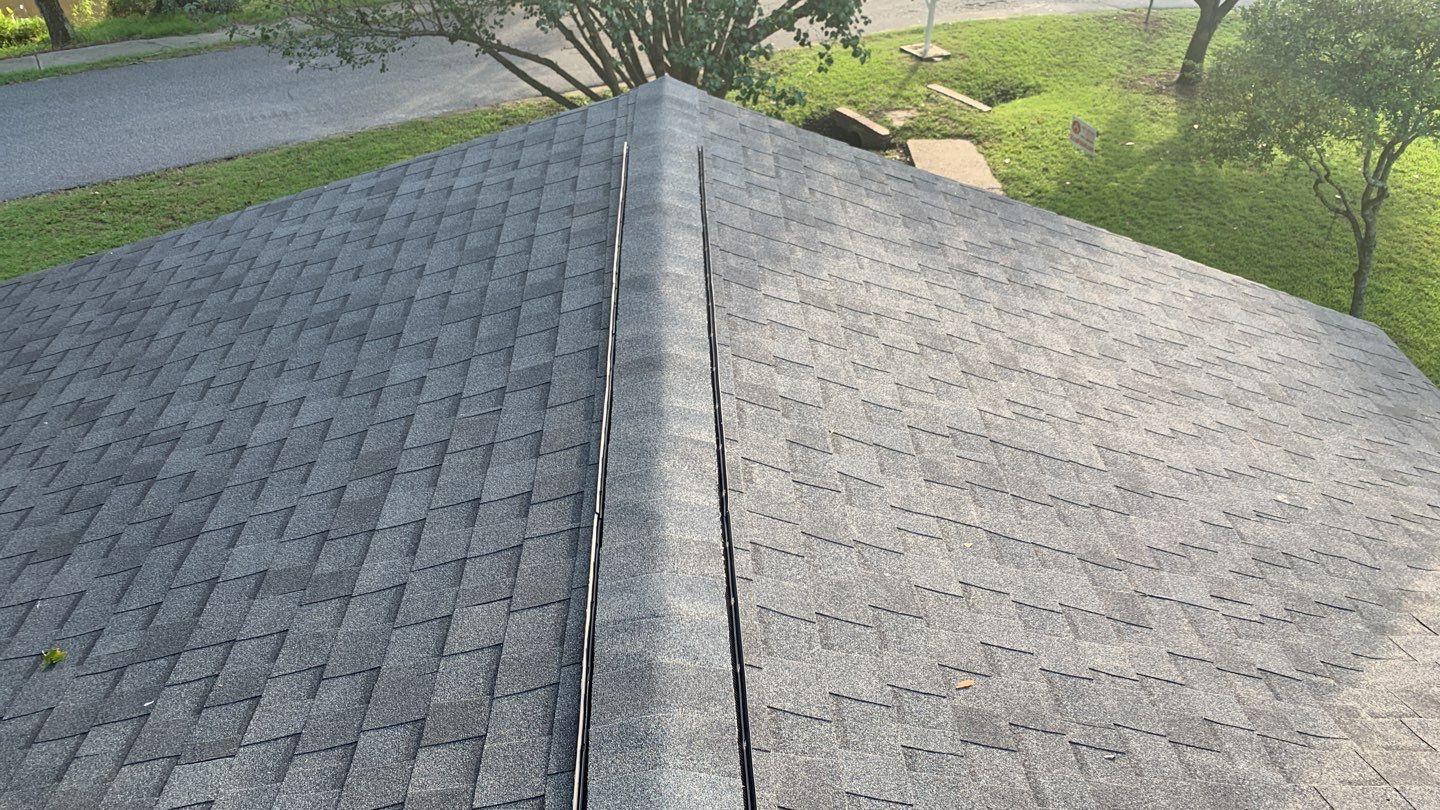 Hail Damage using Atlas Pristine Pinnacle Shingles by Artigues Roofing & Restoration Services