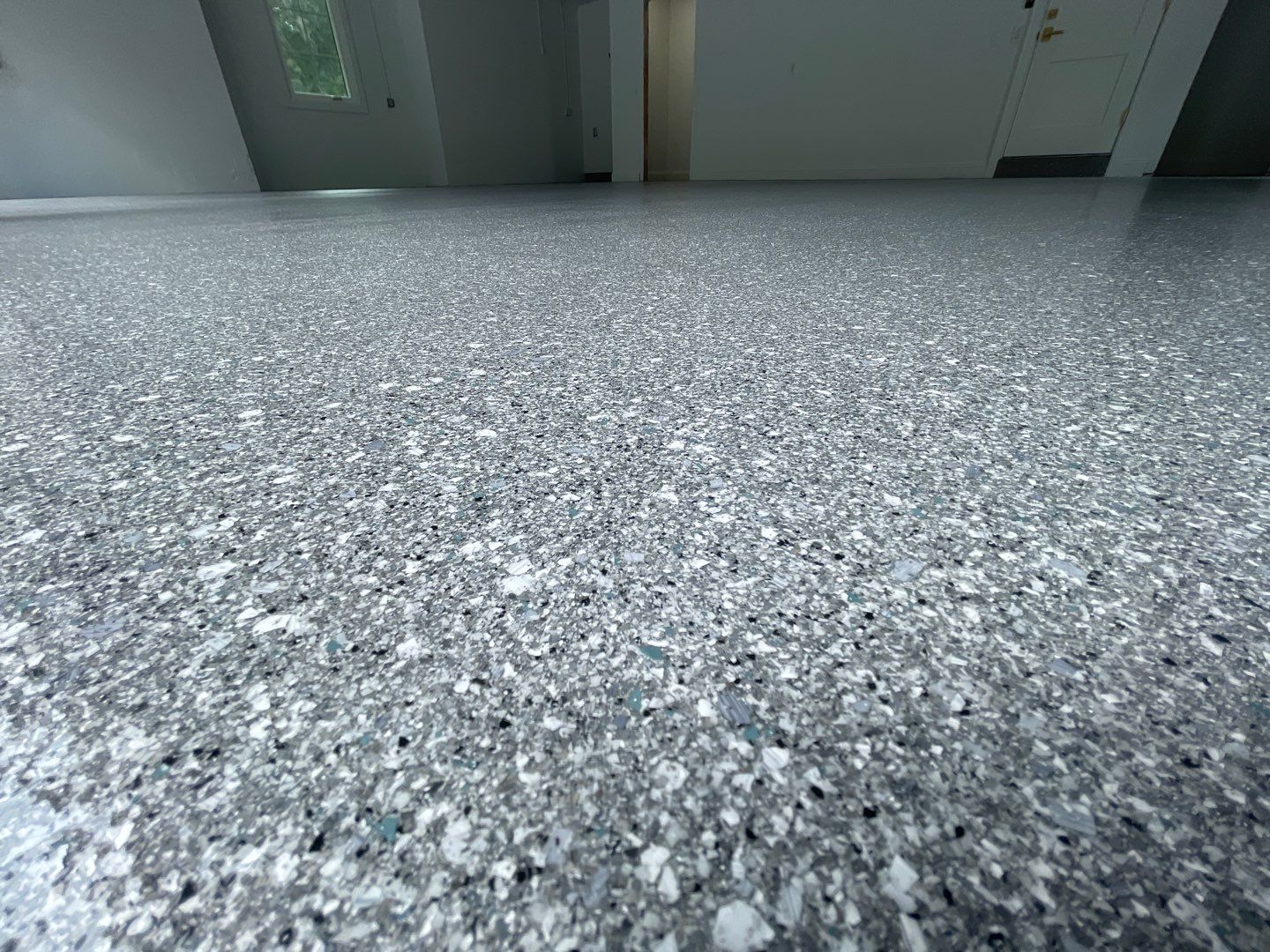 Garage Project in Gainesville, FL in Hybrid Turquoise  by Cross Creek Concrete Coatings