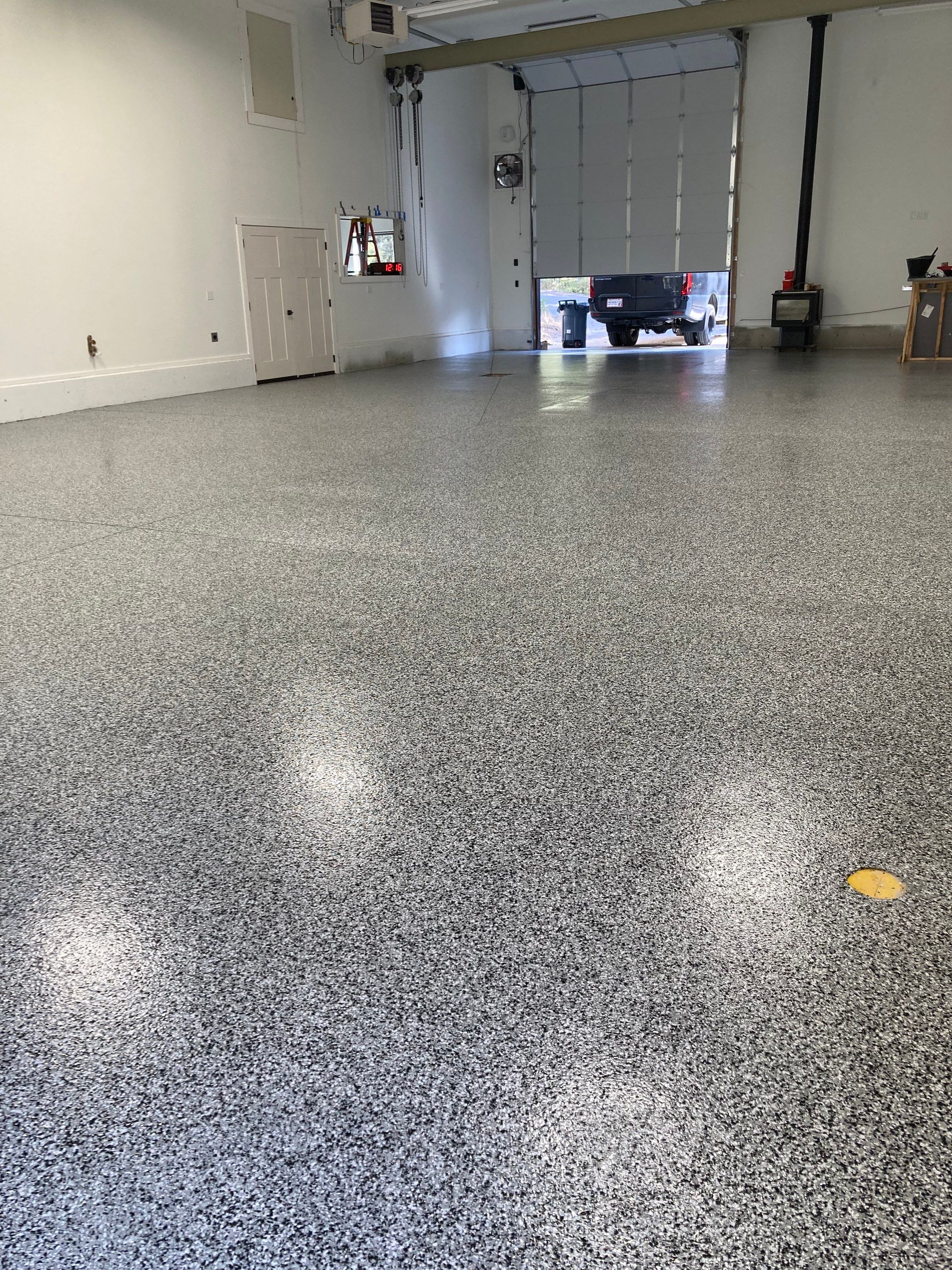 Garage Transformation using Domino and the Penntek Evolution System by Croc Coatings, LLC
