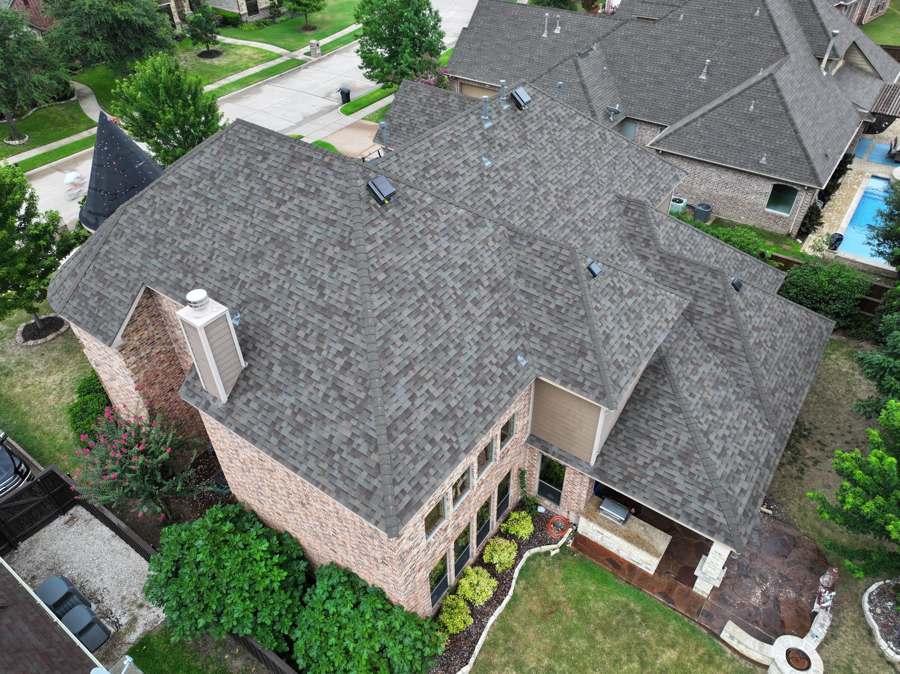Installing Custom copper turret and Malarkey Vista Class 4 shingles Hail Damage Upgrade by Becker Roofing and Exteriors