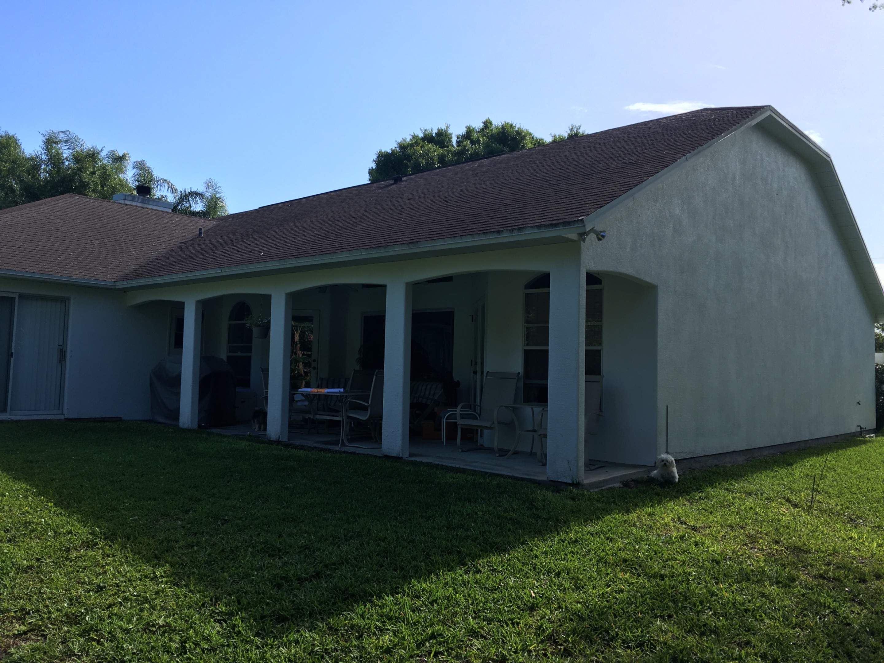 Covered Porch Extension and Structural Patio Addition in Melbourne by Florida Roofing and Renovations Inc.