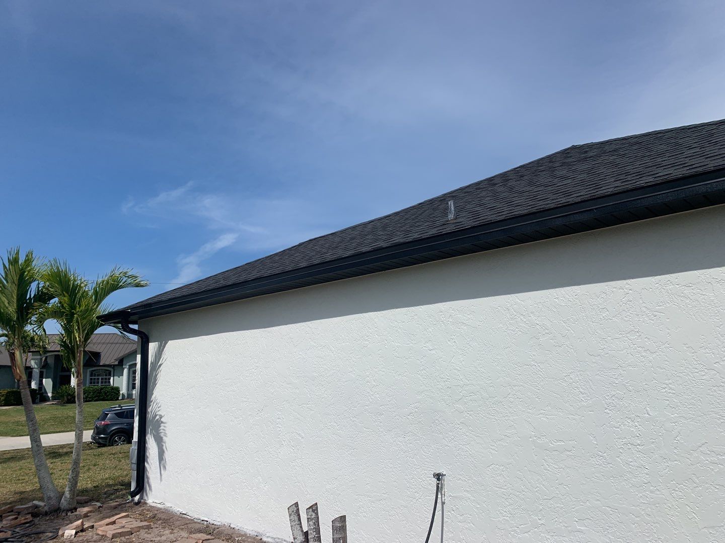 Black Seamless Gutters for Modern Cape Coral Homes by Gutter Professors