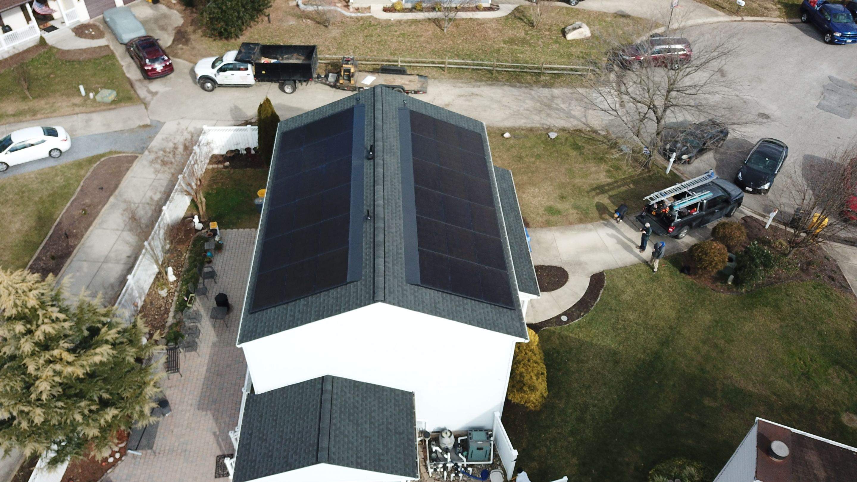 Roof Replacement with GAF Decotech integrated solar panels by American Home Contractors