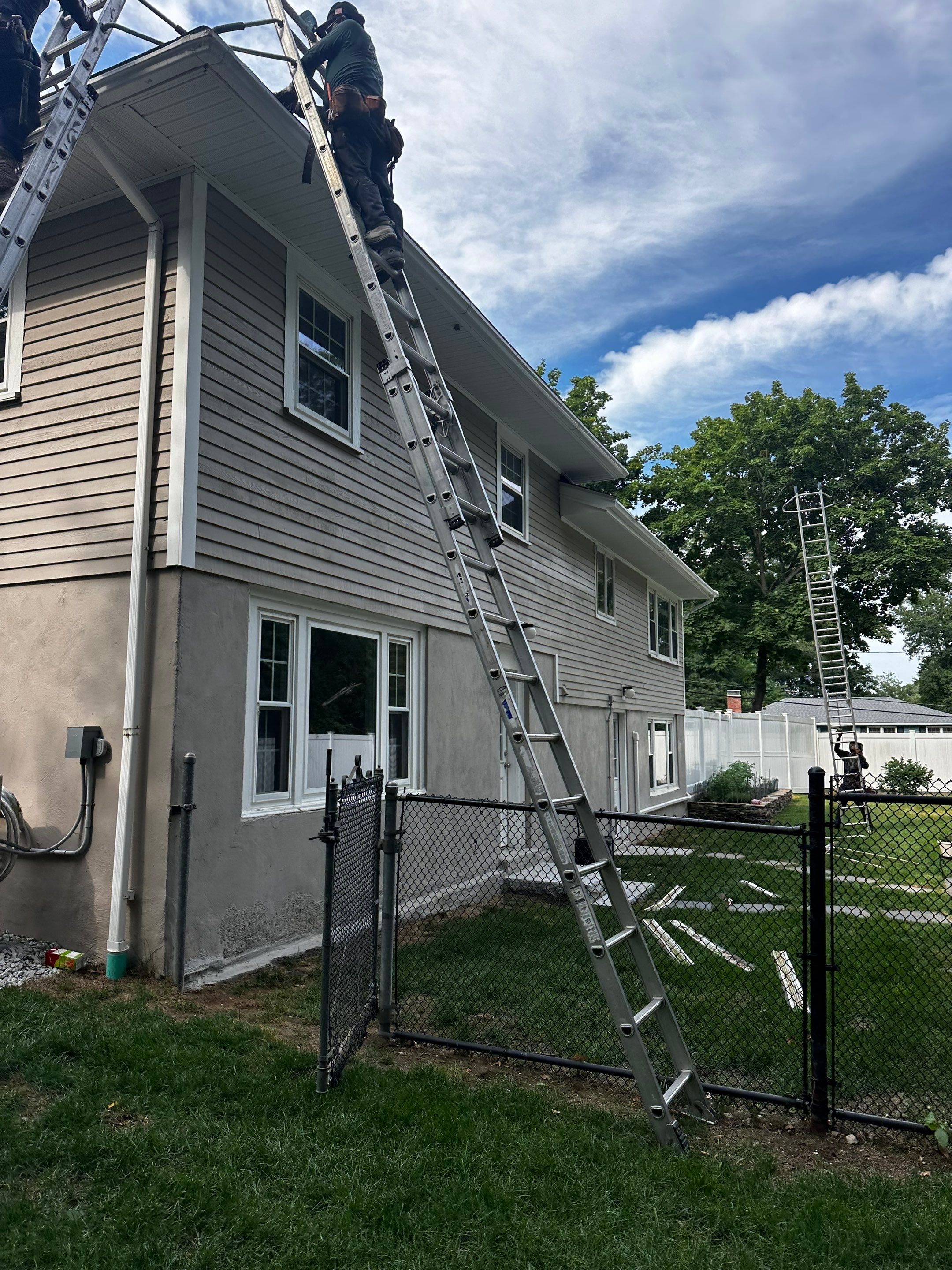 Roof Repair & Fascia Trim Work in Lowell, MA by Mighty Dog Roofing of Greater Middlesex County