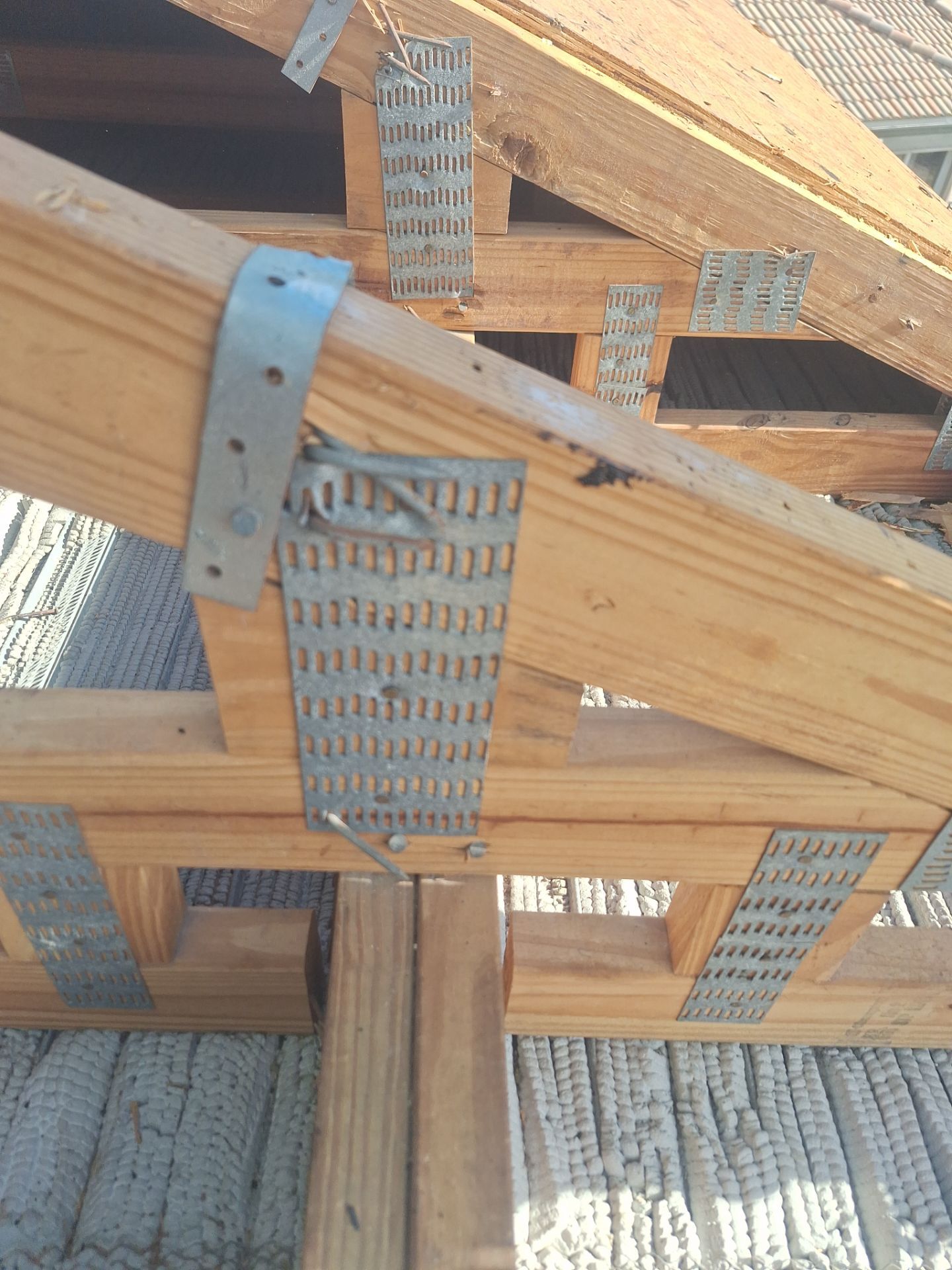 Residential Roofing Installation using 1" Nail strip metal roof by BLUES BROTHERS CONSTRUCTION CORP