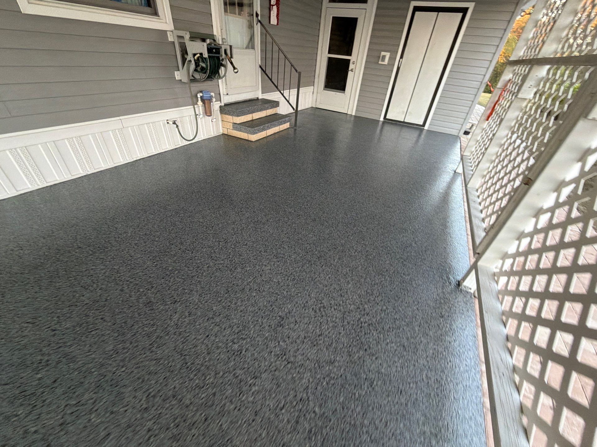 Driveway Transformation: Nightfall Flake System with Full UV & Moisture Protection by Performance Floors & Coating
