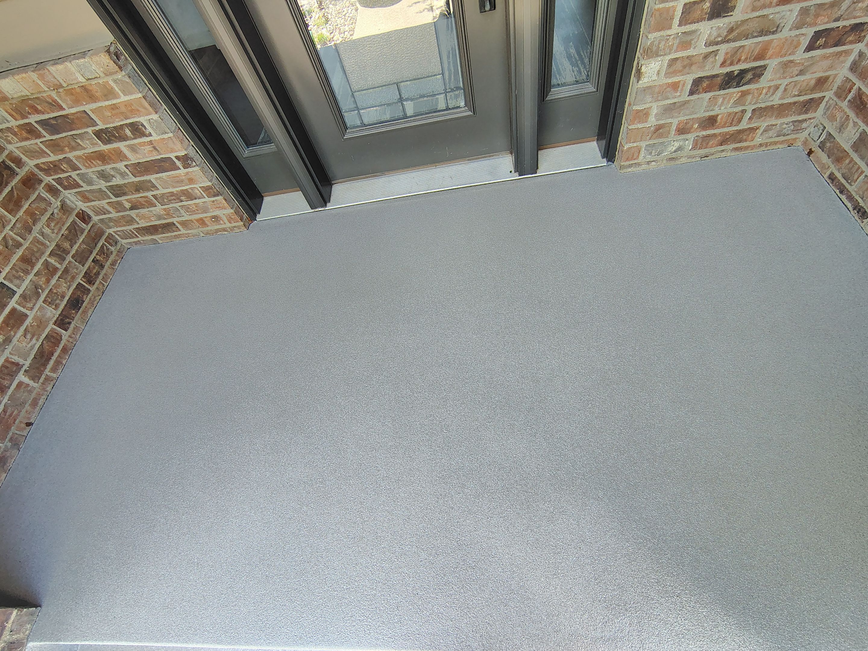Front Porch Concrete Coating and Restoration in Harrisburg by Select Painting, Coatings & Garage Cabinets