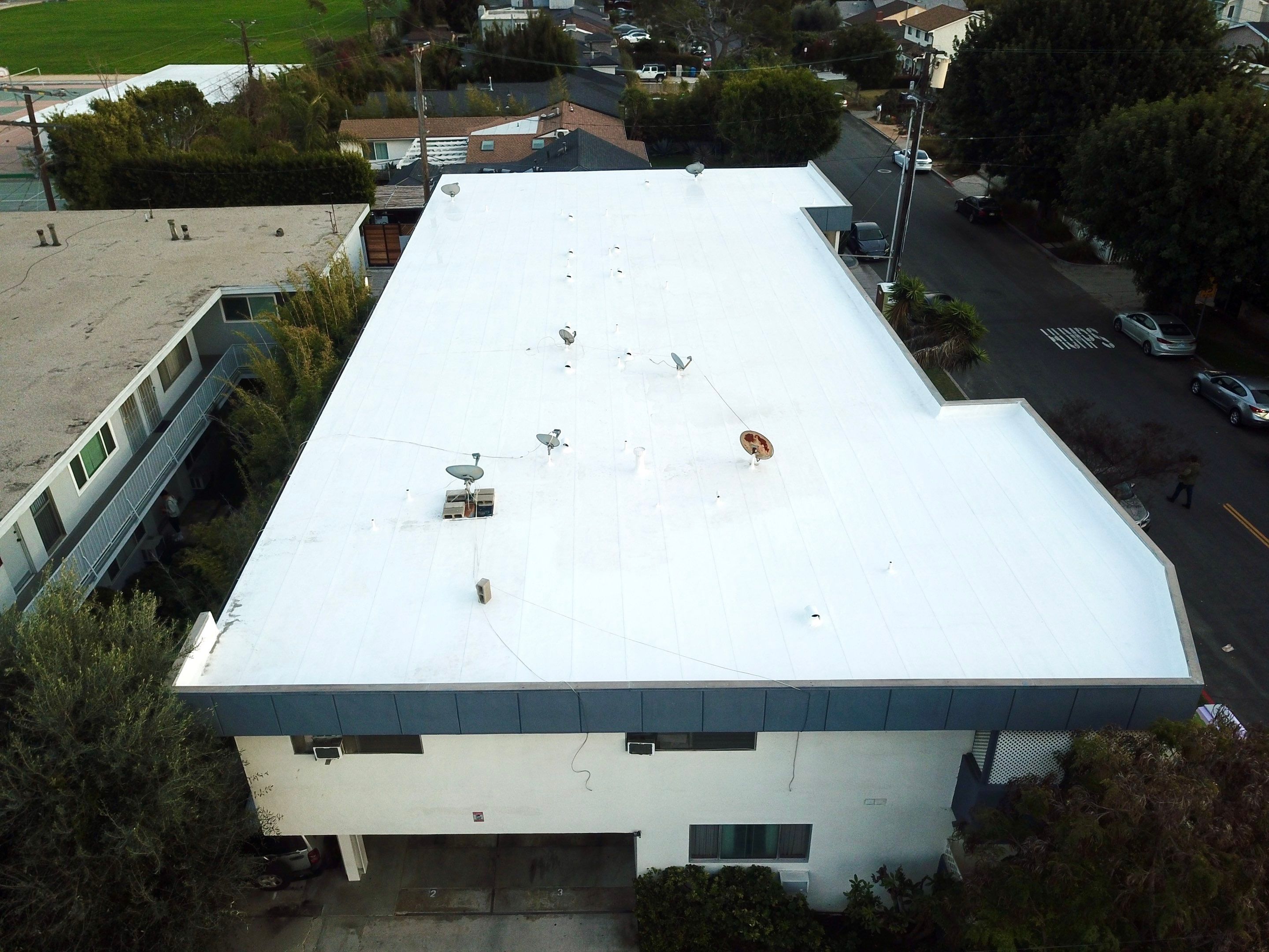 Apartment Building - Silicone Installation using ASC's Silicone Membrane by Hull Brothers Roofing
