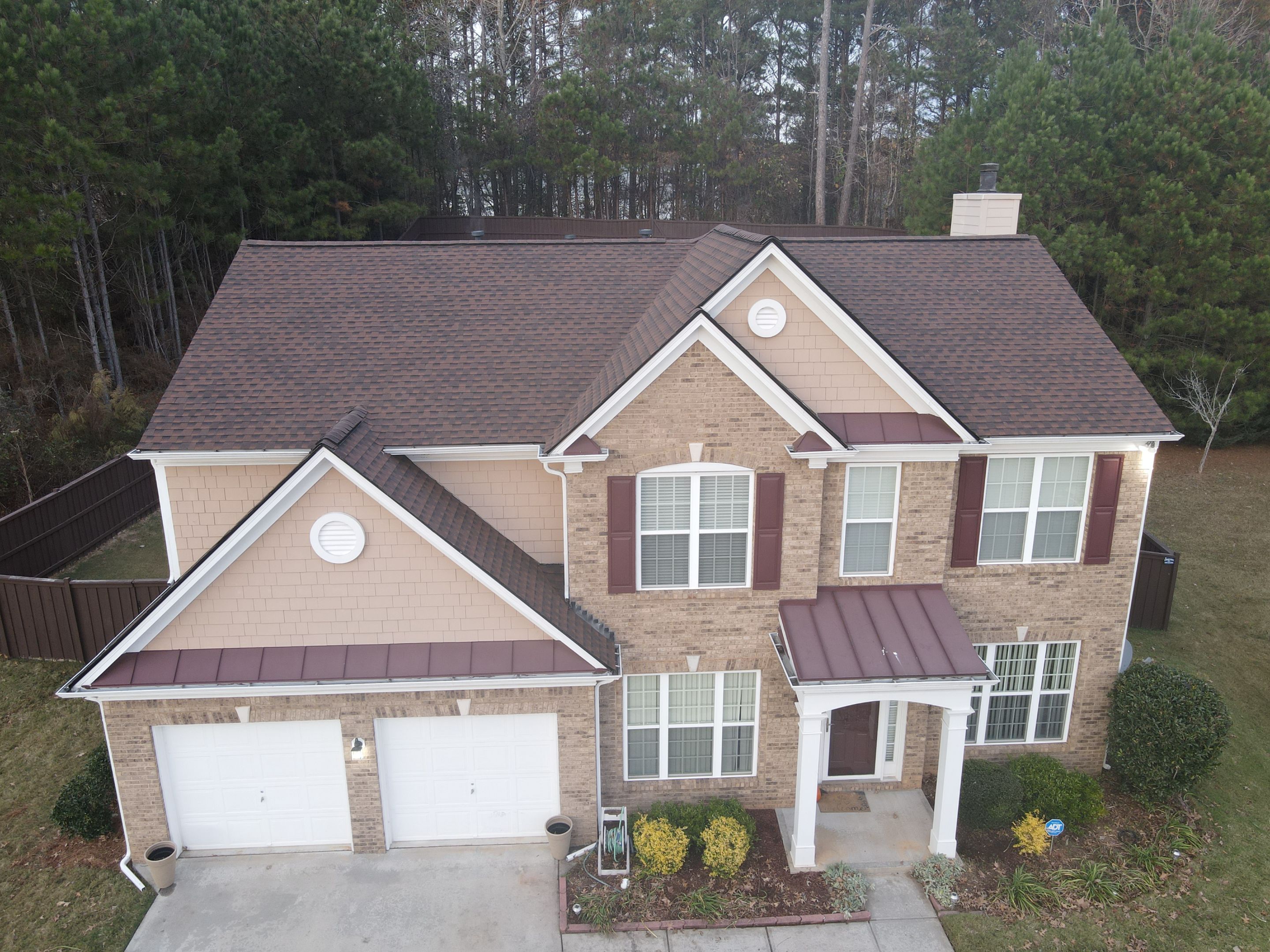 Residential Roofing Installation using Timberline HDZ Hickory  by Inspector Roofing and Restoration