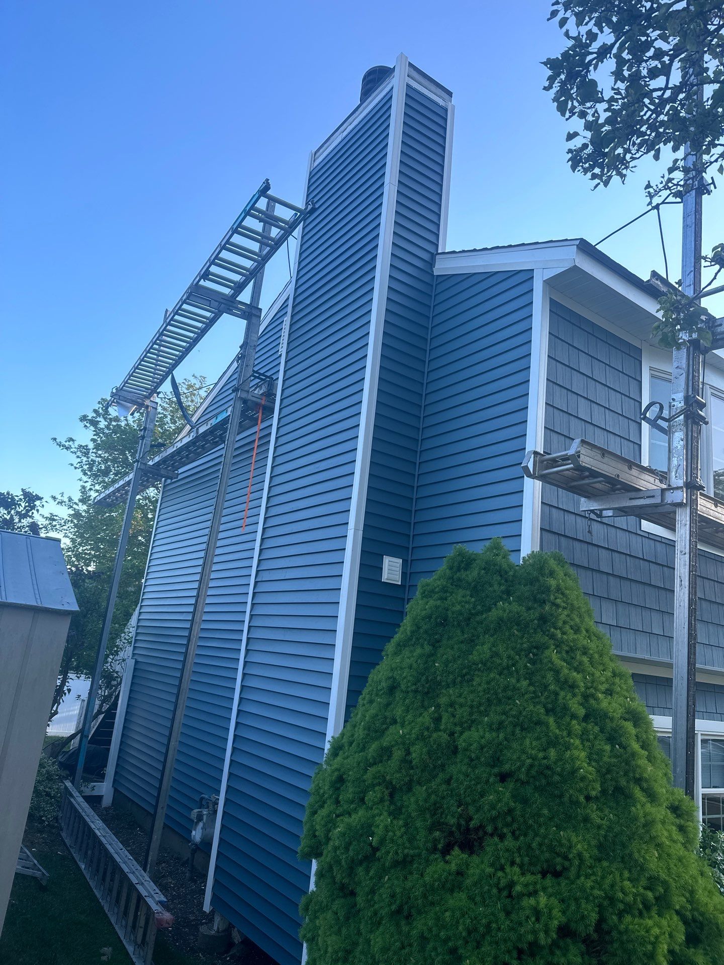 Siding Installation using Certainteed Cedar Impressions Straight Edge Perfection Shingles - D7 - Pacific Blue by A Plus Exterior