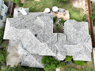 Residential Roof Replacement using 30 Year Laminate Shingles with High Profile Ridge