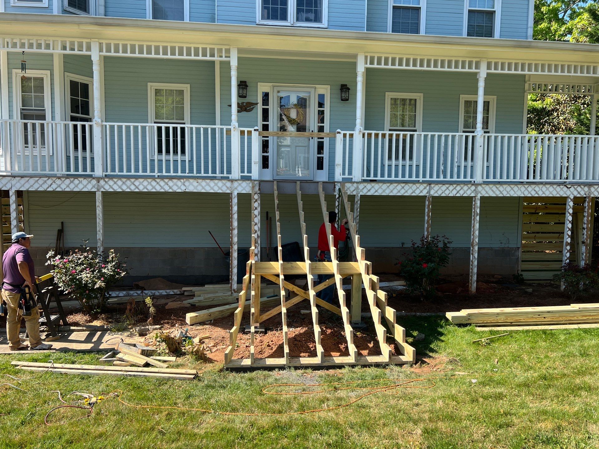 Marietta Porch Upgrade with Horizontal Pressure-Treated Wood Slats by Swift Home Renovations