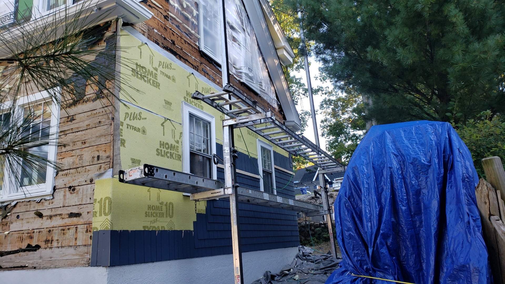 Siding Installation using Red Cedar by UBrothers Construction
