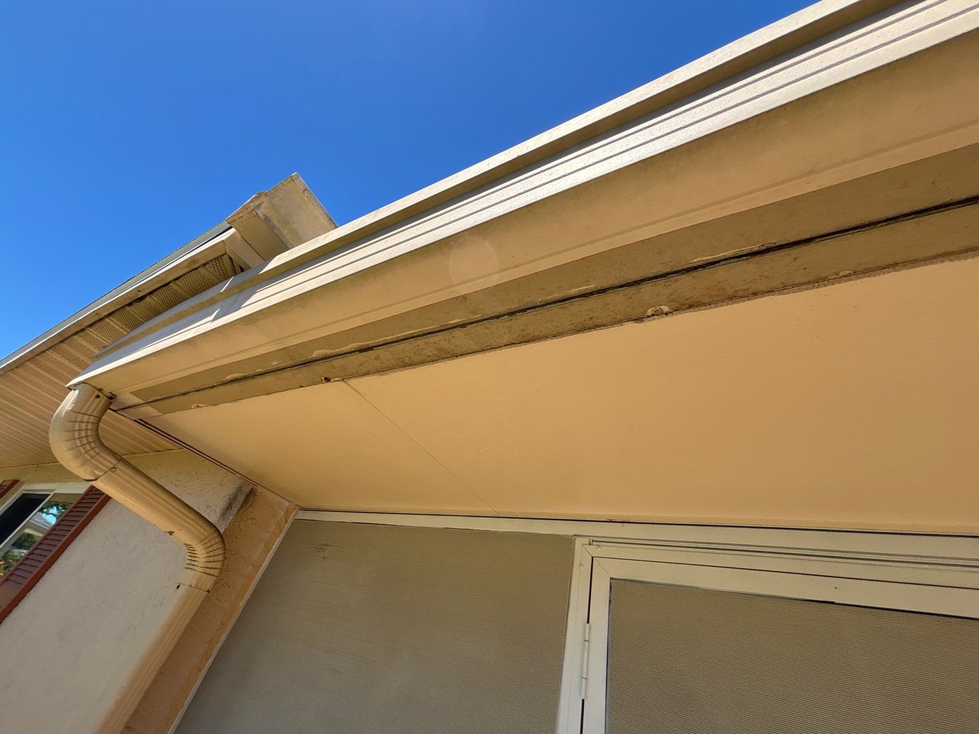 White Vinyl Gutters Installation in Sarasota FL by Gutter Professors