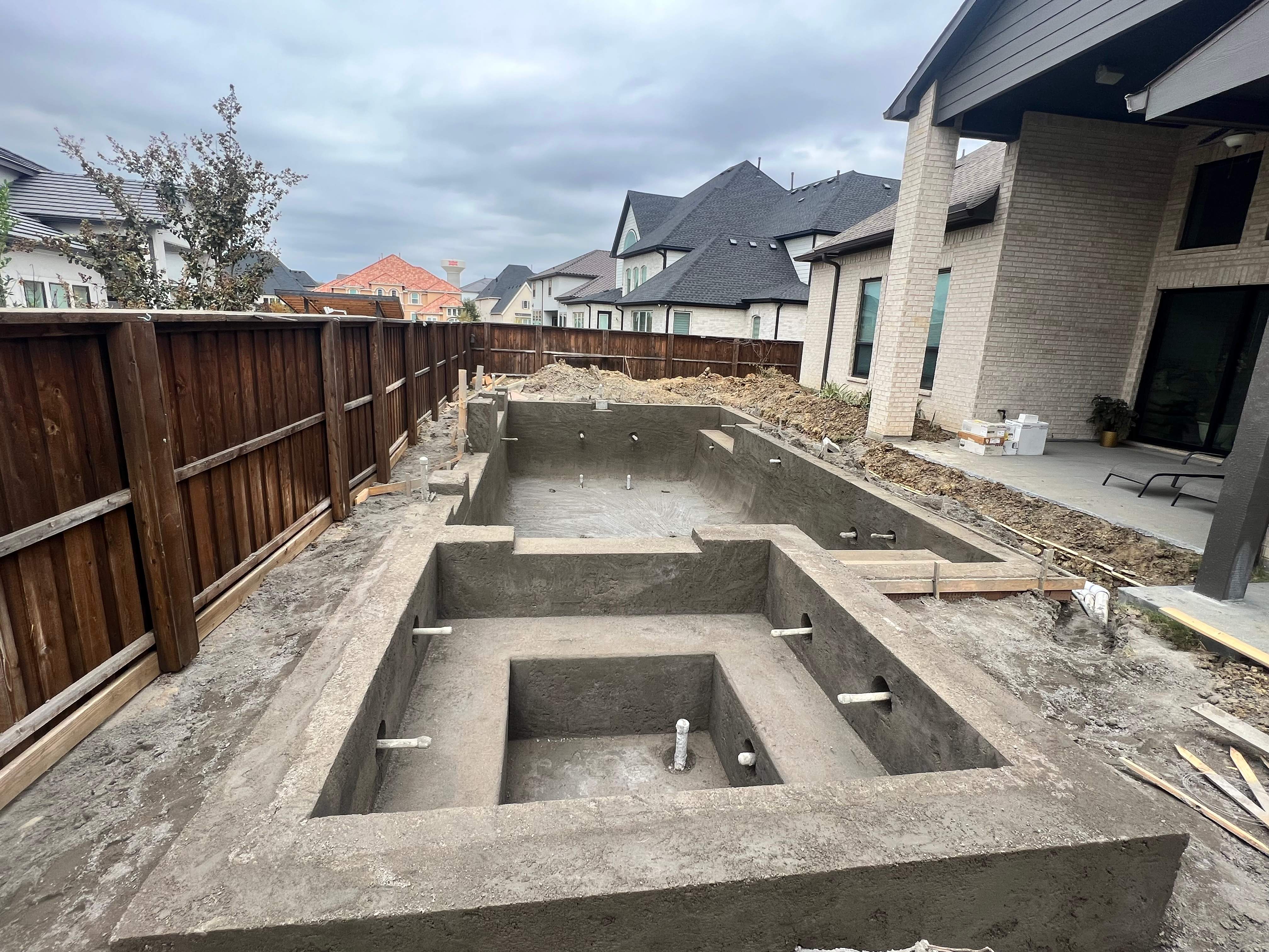 Modern Geometric Pool with Raised Spa by Pinnacle Pools and Spas - DFW