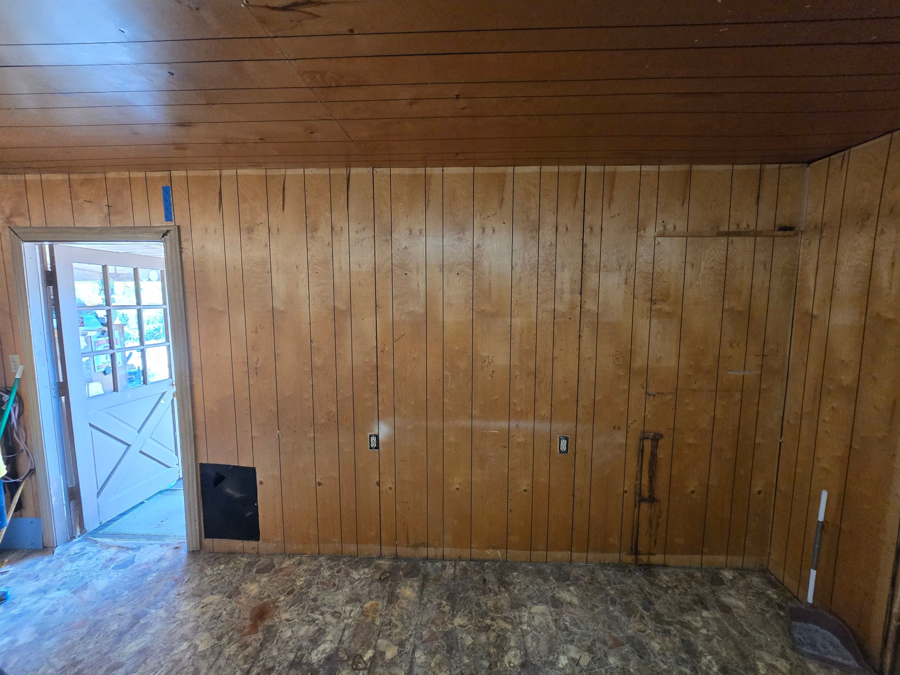 Paneling to Sheetrock Conversion by Very Good Construction Company