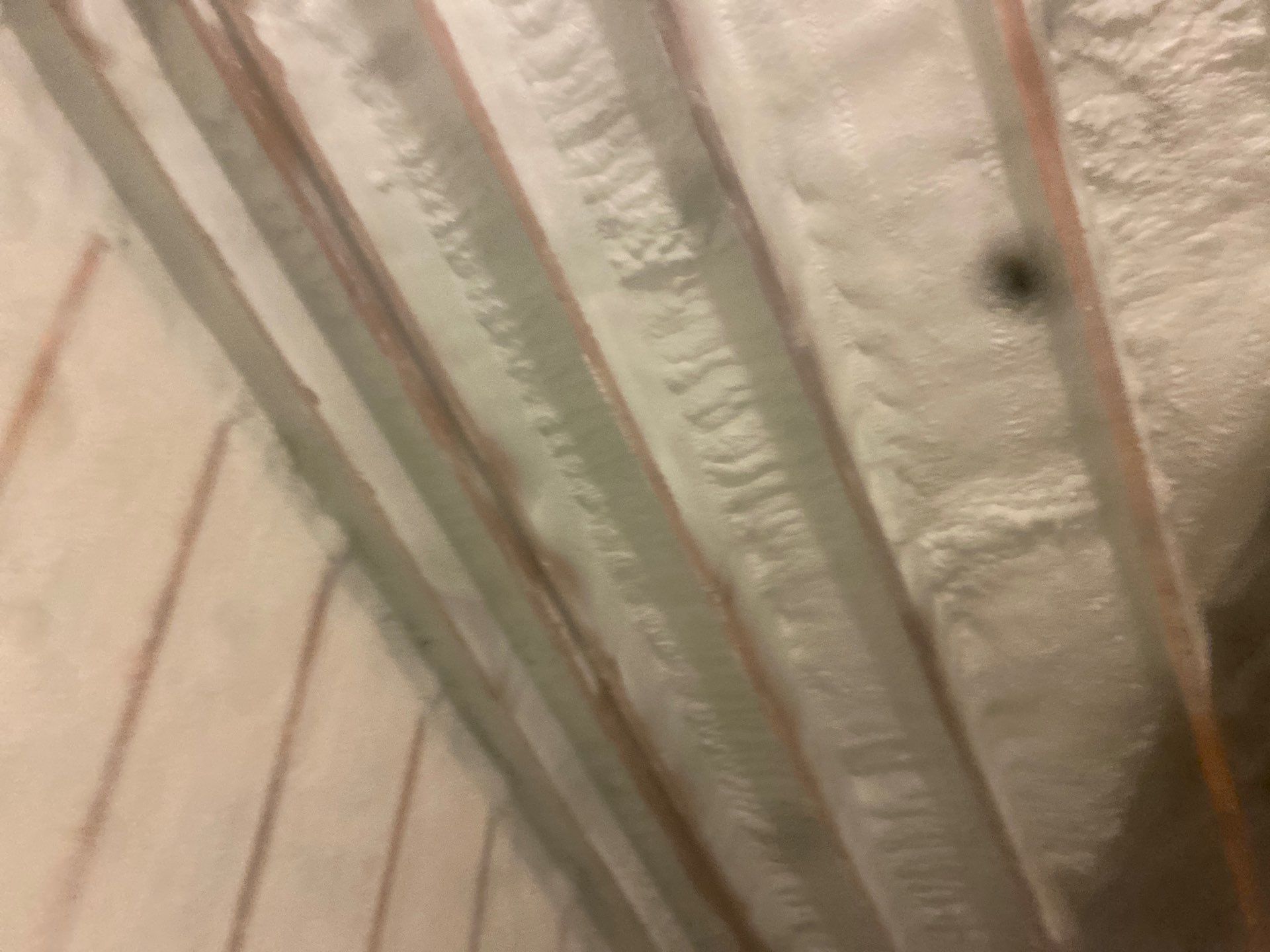 Attic Retrofit using open cell spray foam by NYS Foam & Energy