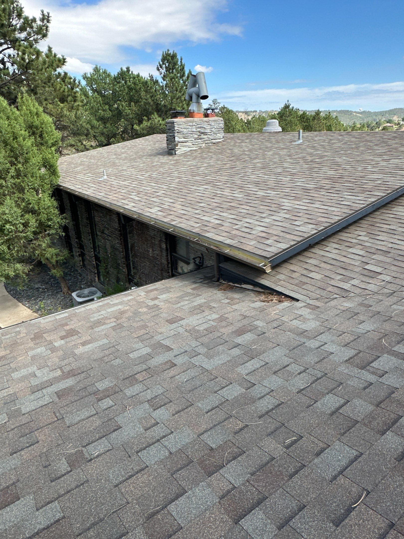 Full Architectural Shingle Installation for Contemporary Rapid City Residence by Weather-Tite Exteriors LLC