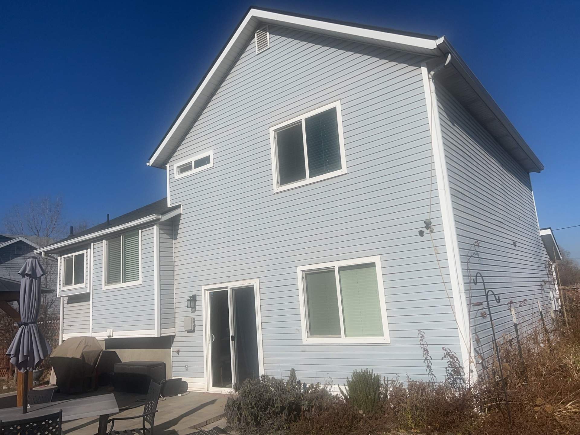 Salt Lake City | Premium Insulated Vinyl & Mixed Materials | Crisp White & Black by Ideal Siding Utah